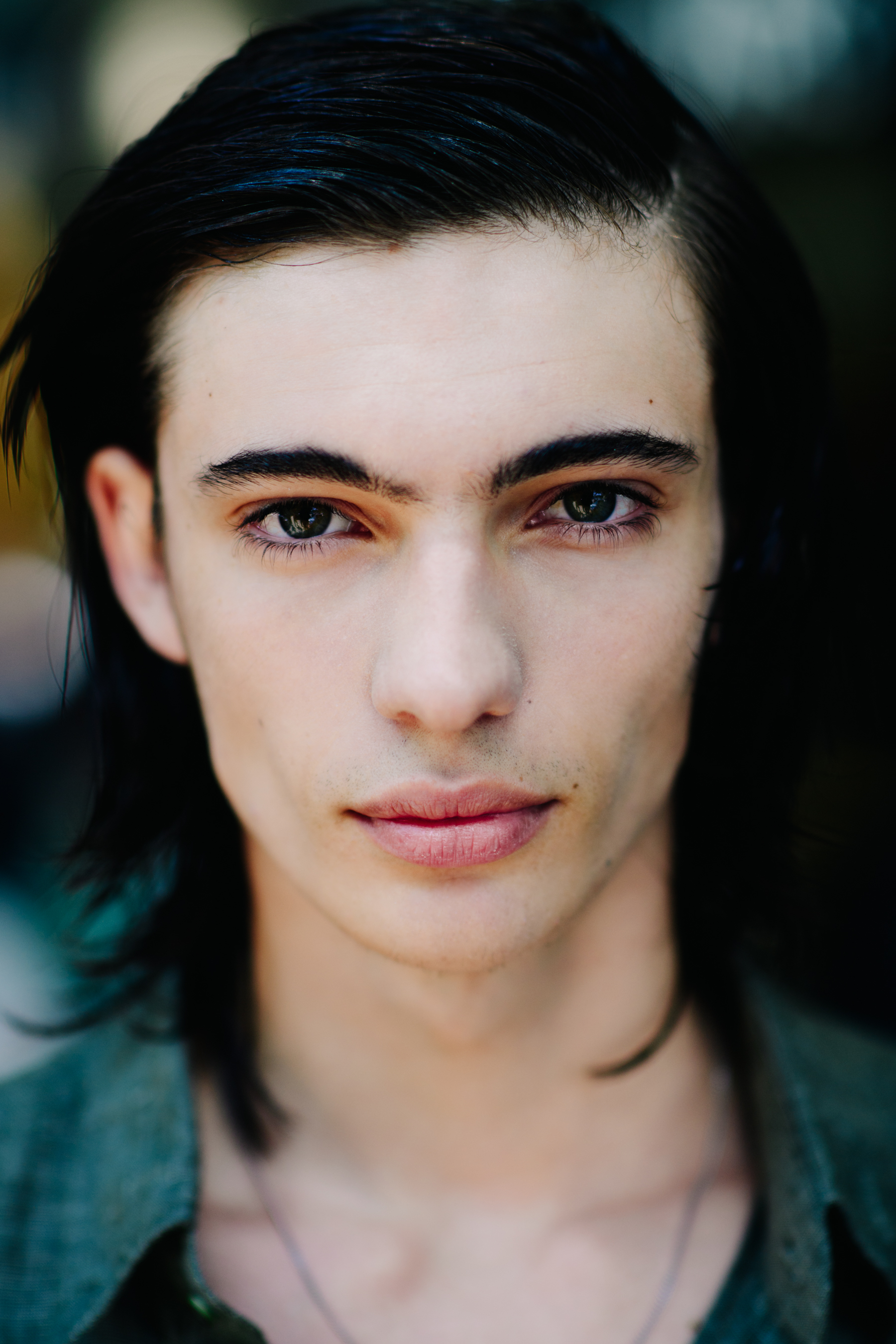 Male model with long dark hair