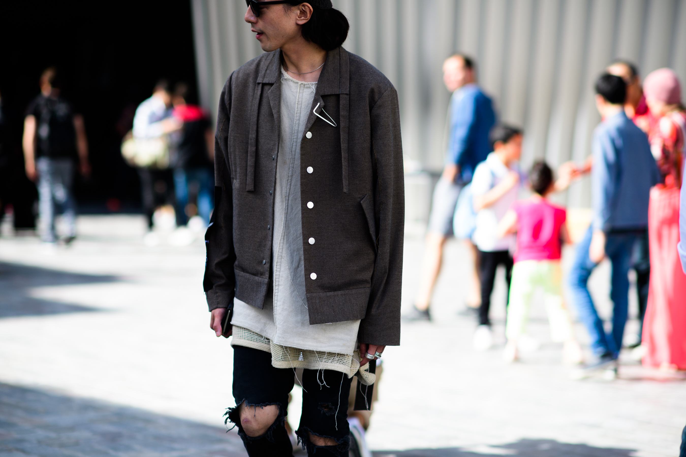 Beige top with black trousers
