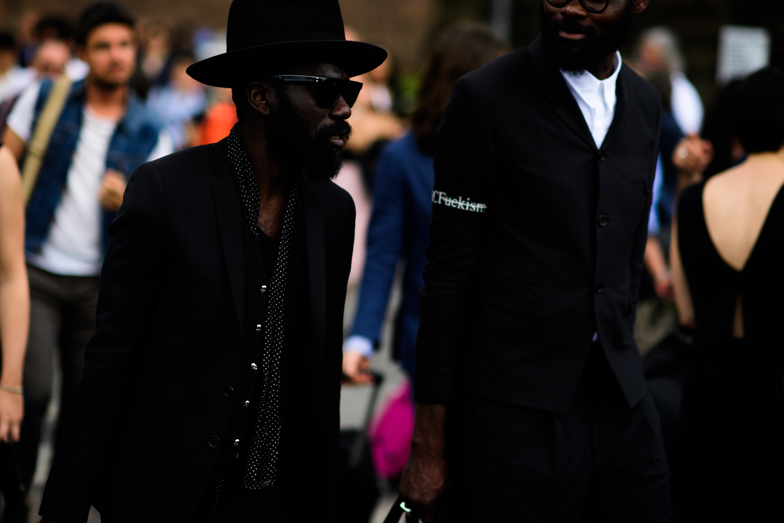 Two men in classy black suits