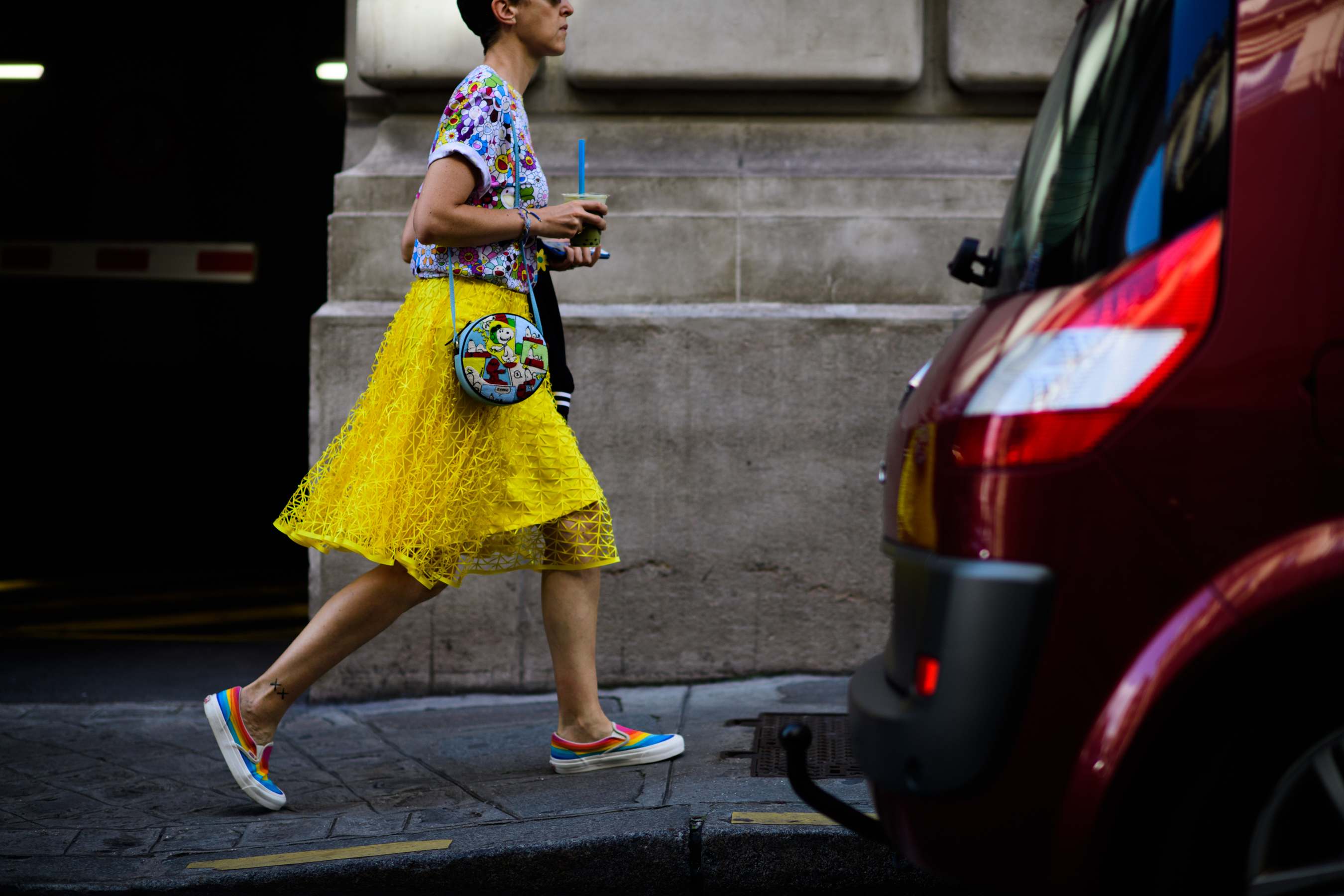 A woman wearing a yellow skirt