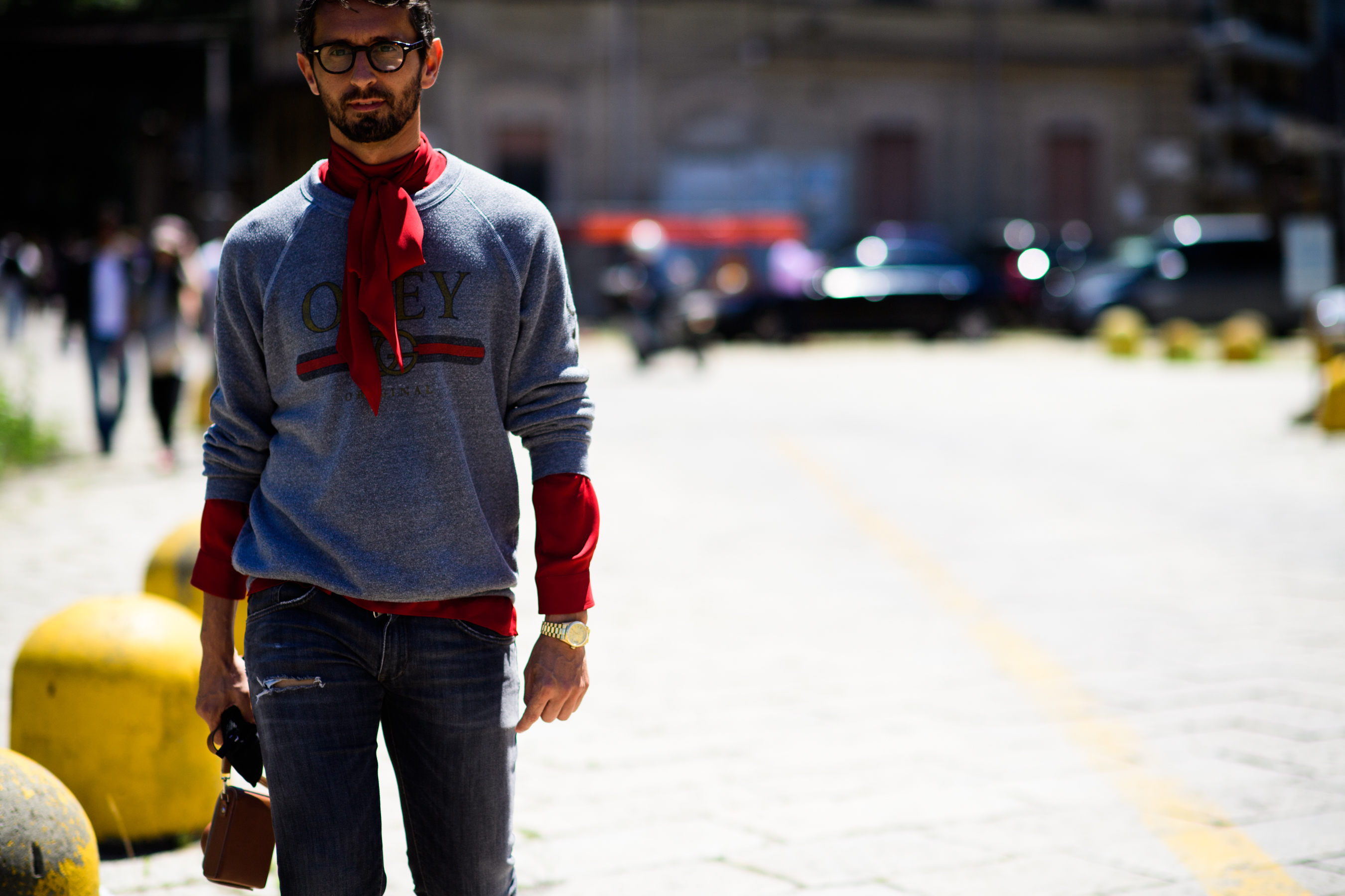 A man in a grey sweatshirt