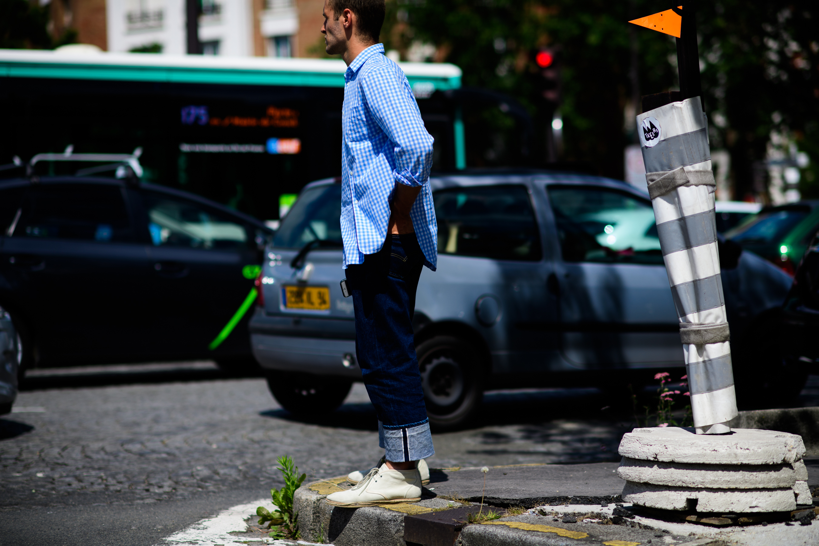 French designer in blue shirt