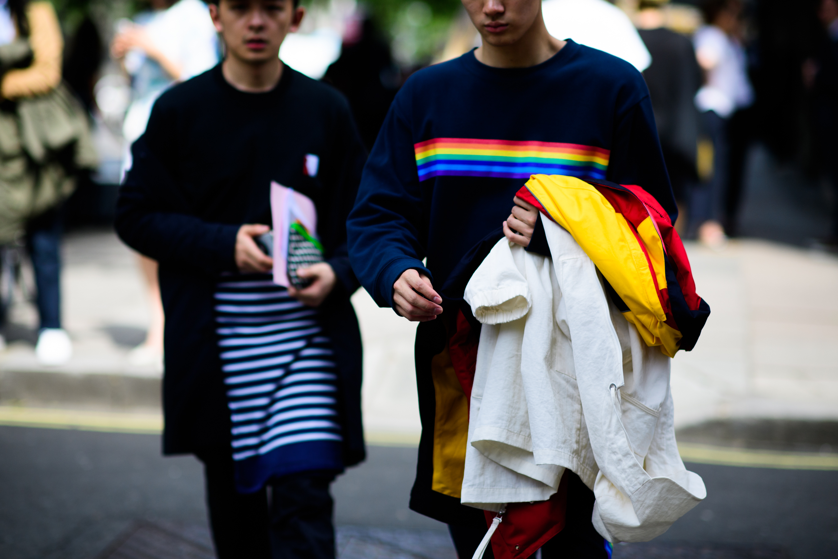 Blue sweatshirt, rainbow, yellow coat