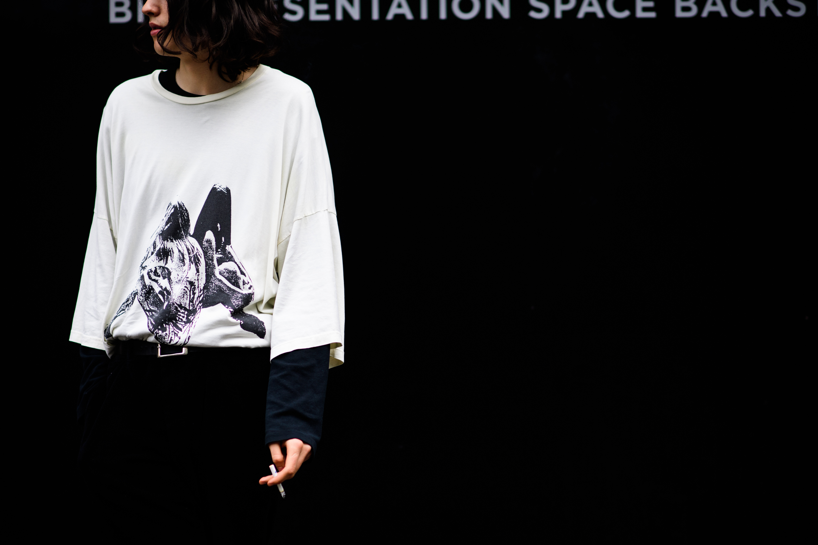 White sweatshirt with a black print