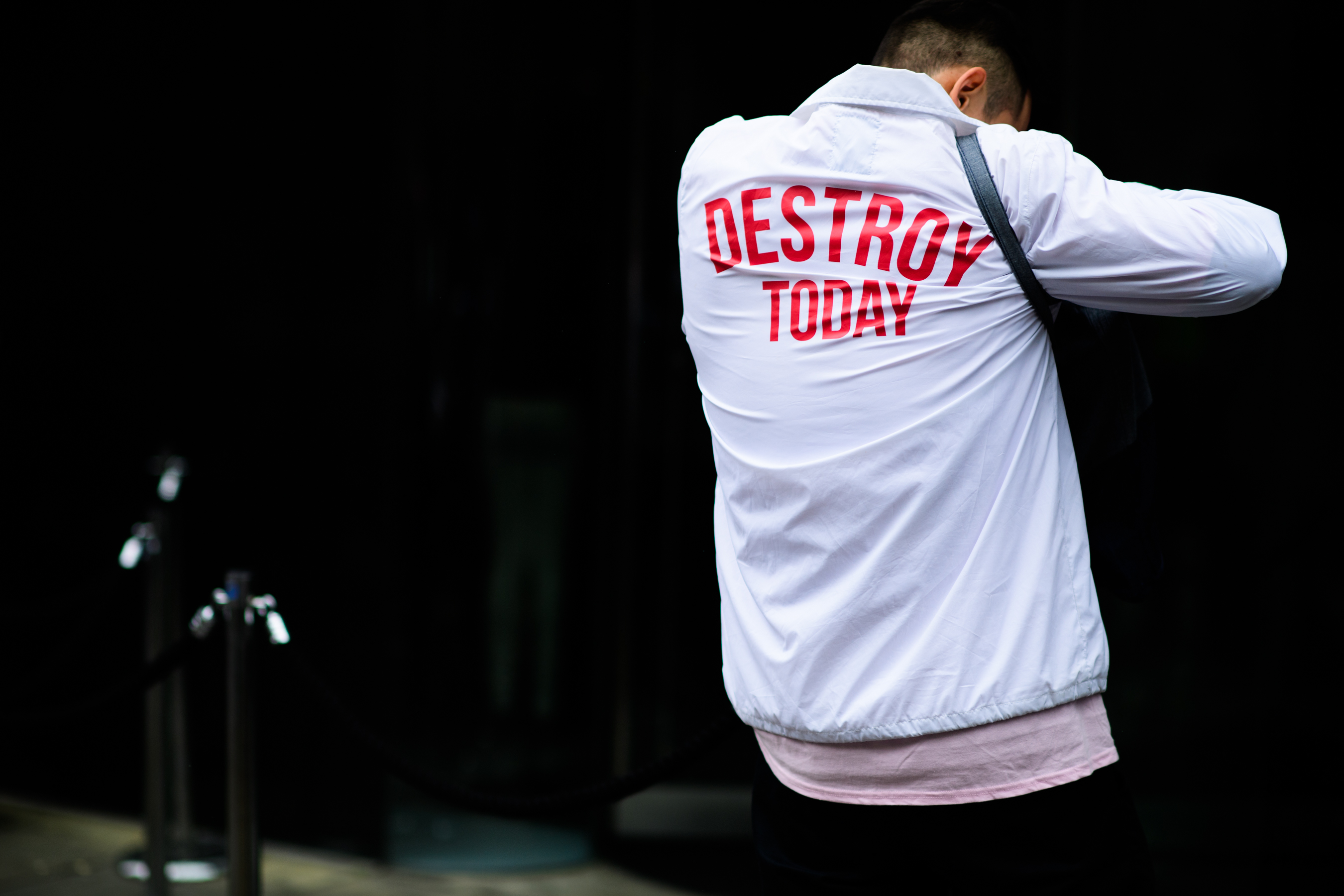 A white jacket with red signs