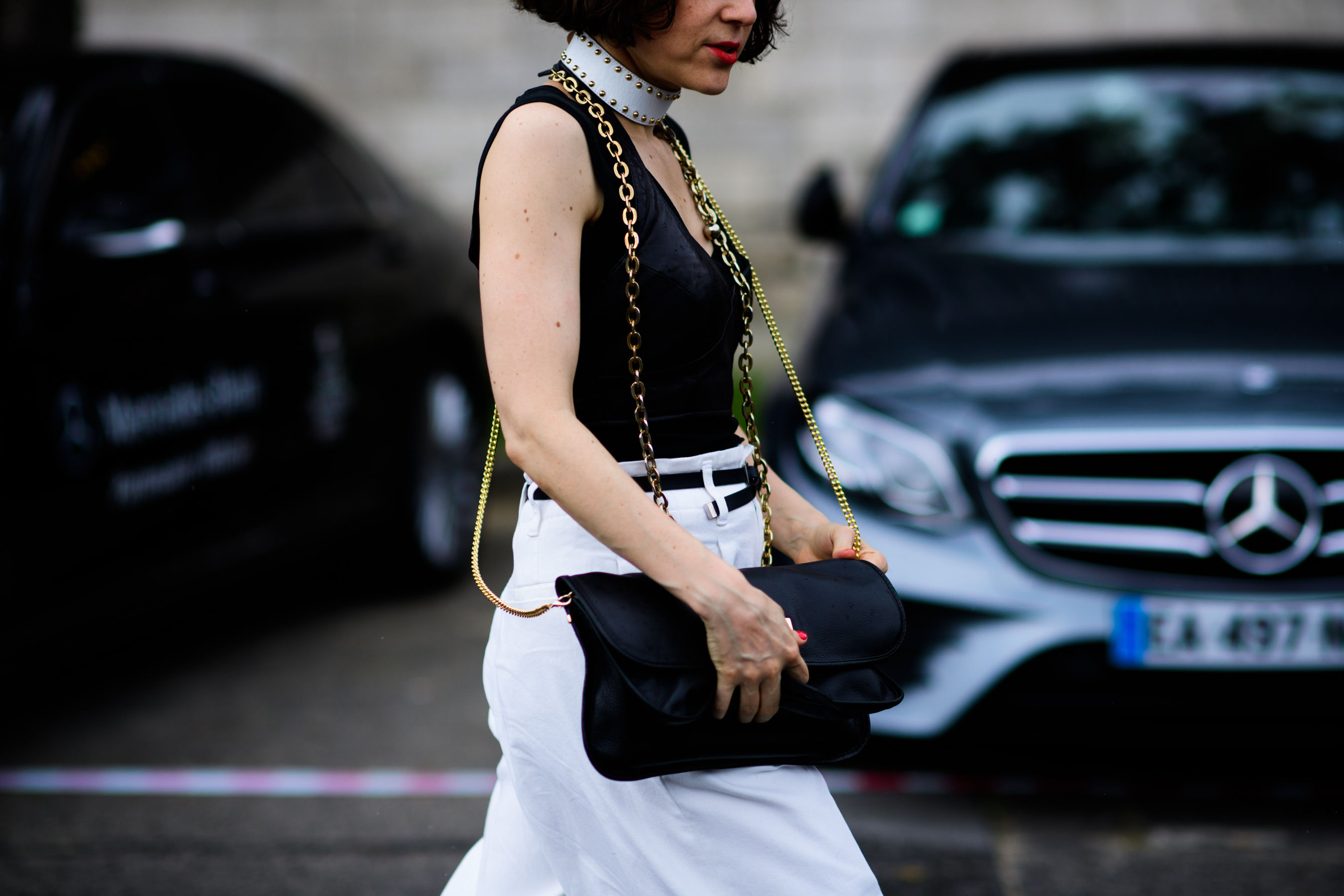A woman wearing a black and white outfit
