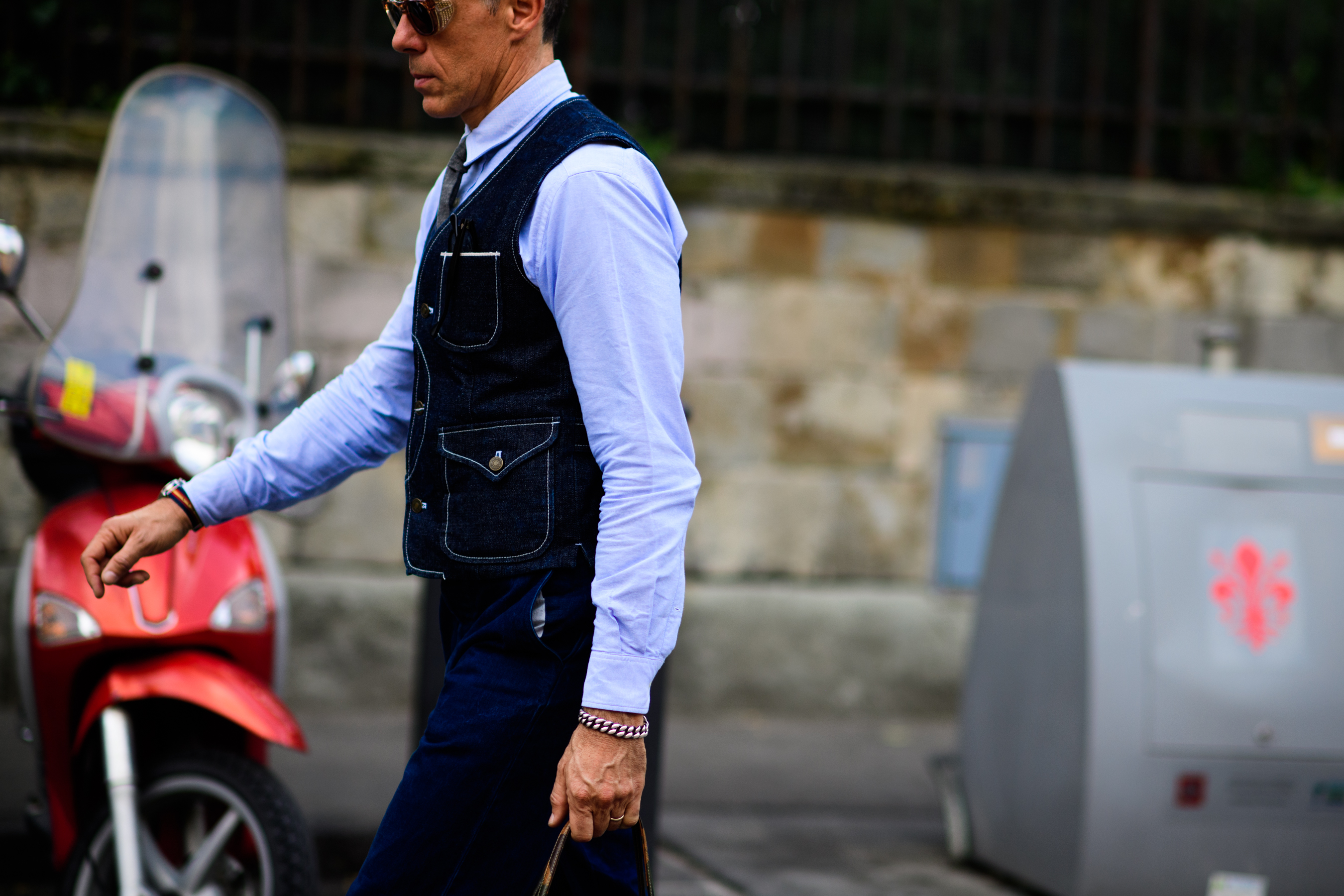 A man in a shirt and a waistcoat