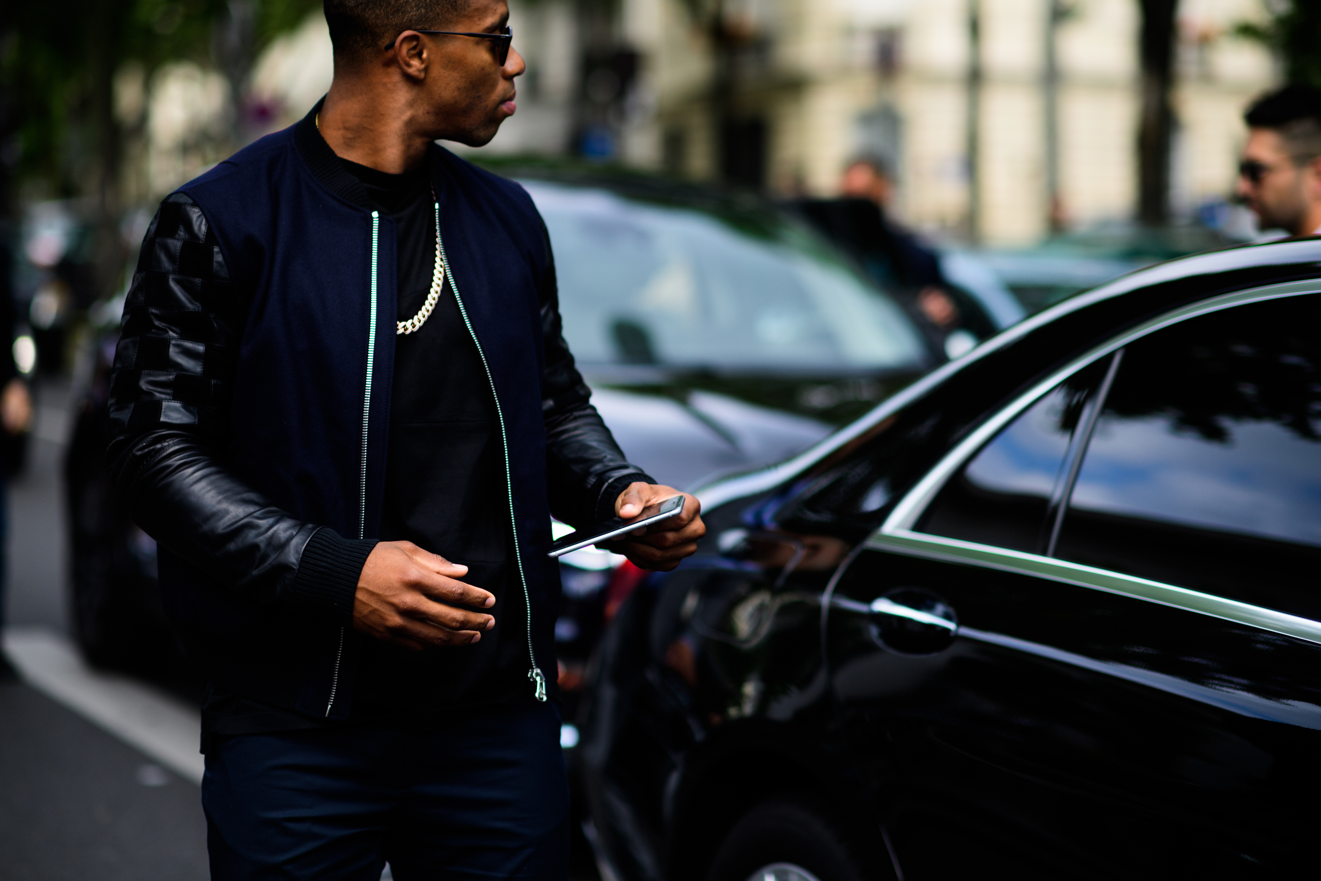Man in dark blue jacket