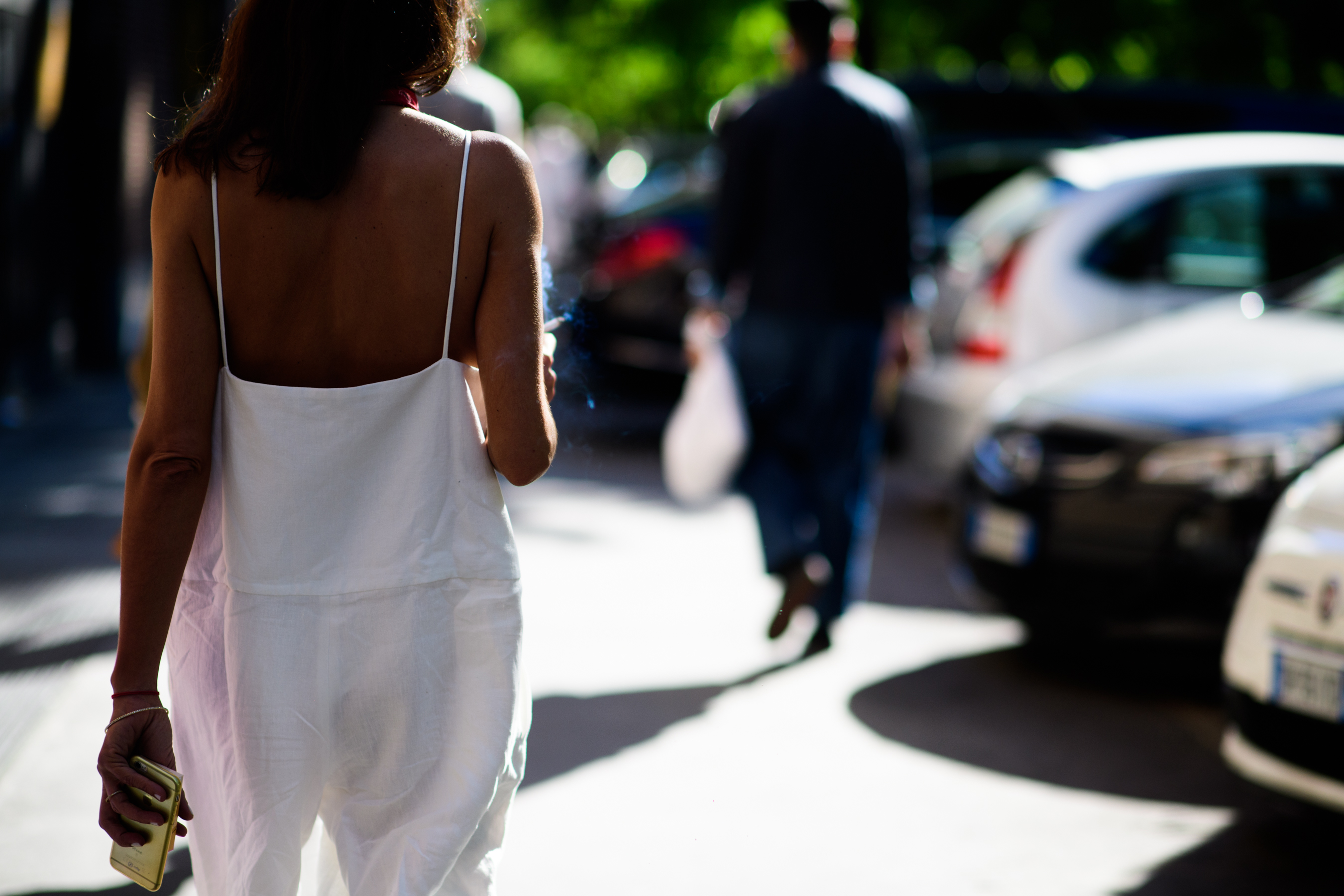 A woman in a white romper