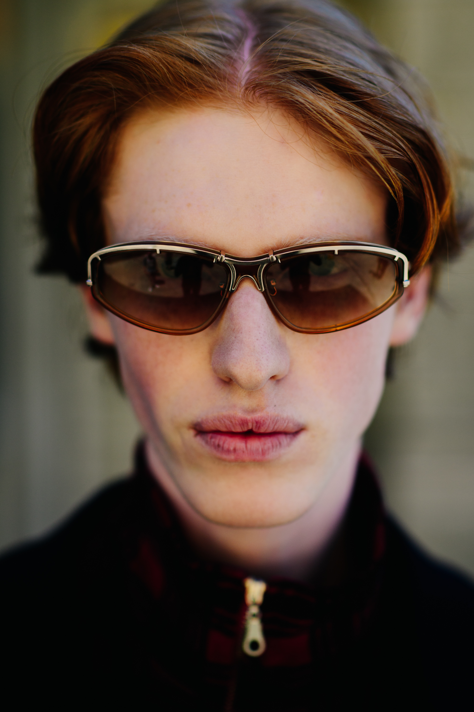A red-haired man in sunglasses