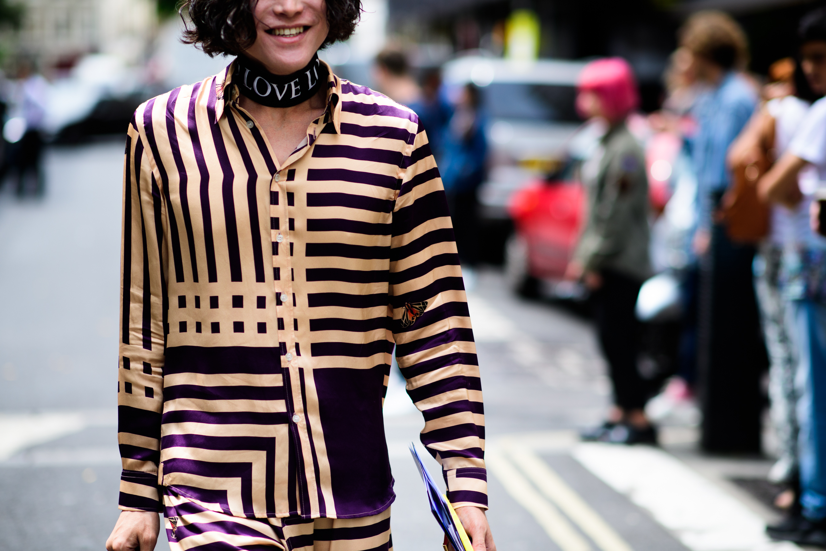 A man in a striped blouse