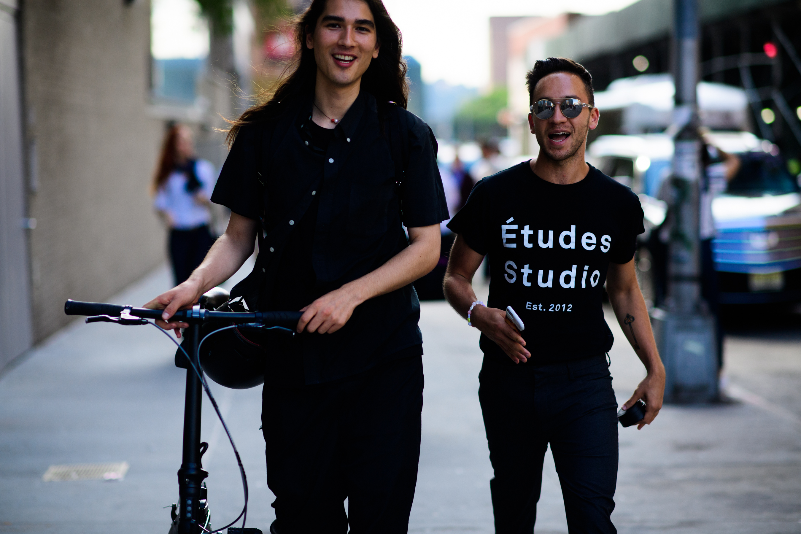 Two men wearing all black