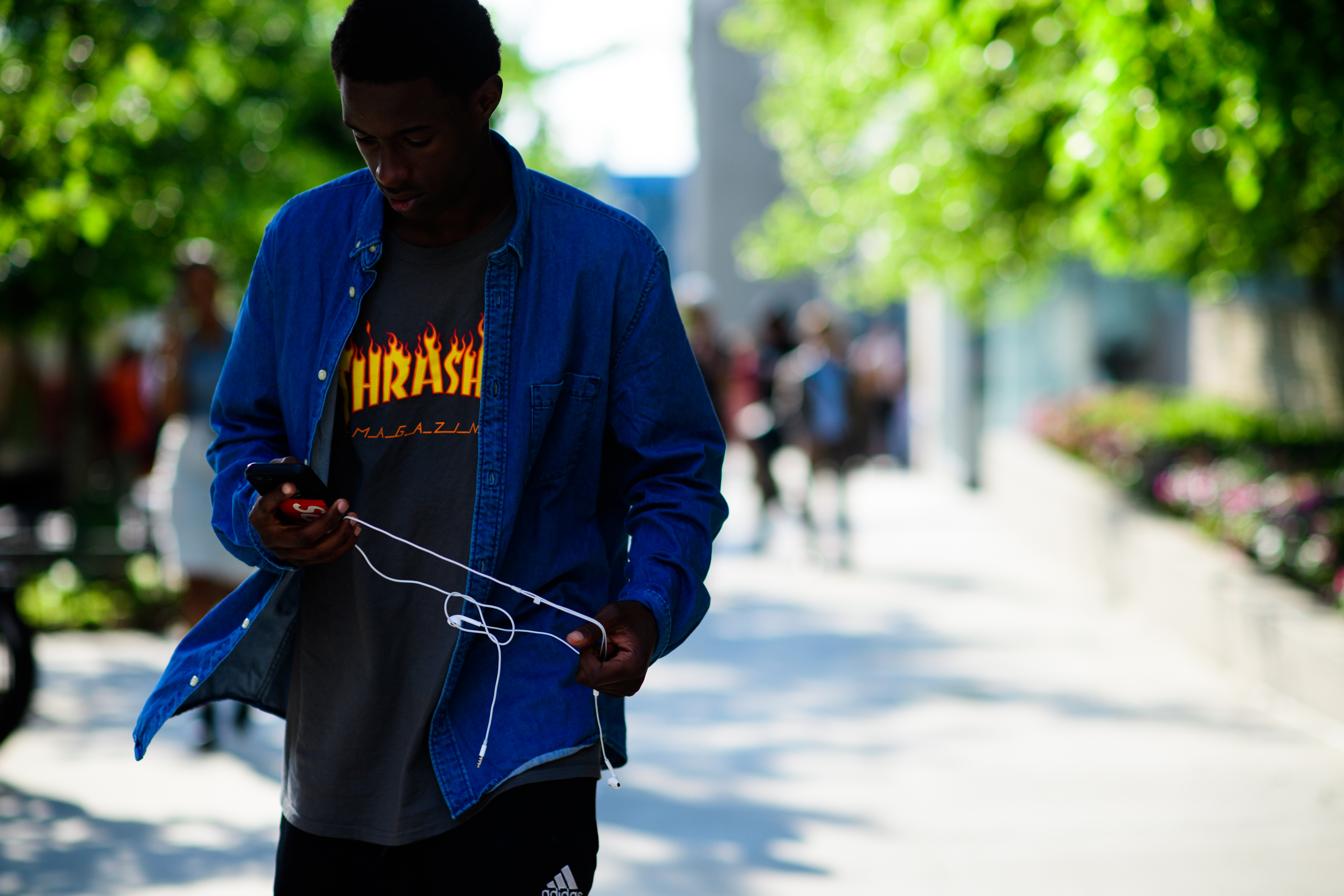 Young skater model wearing Thrasher