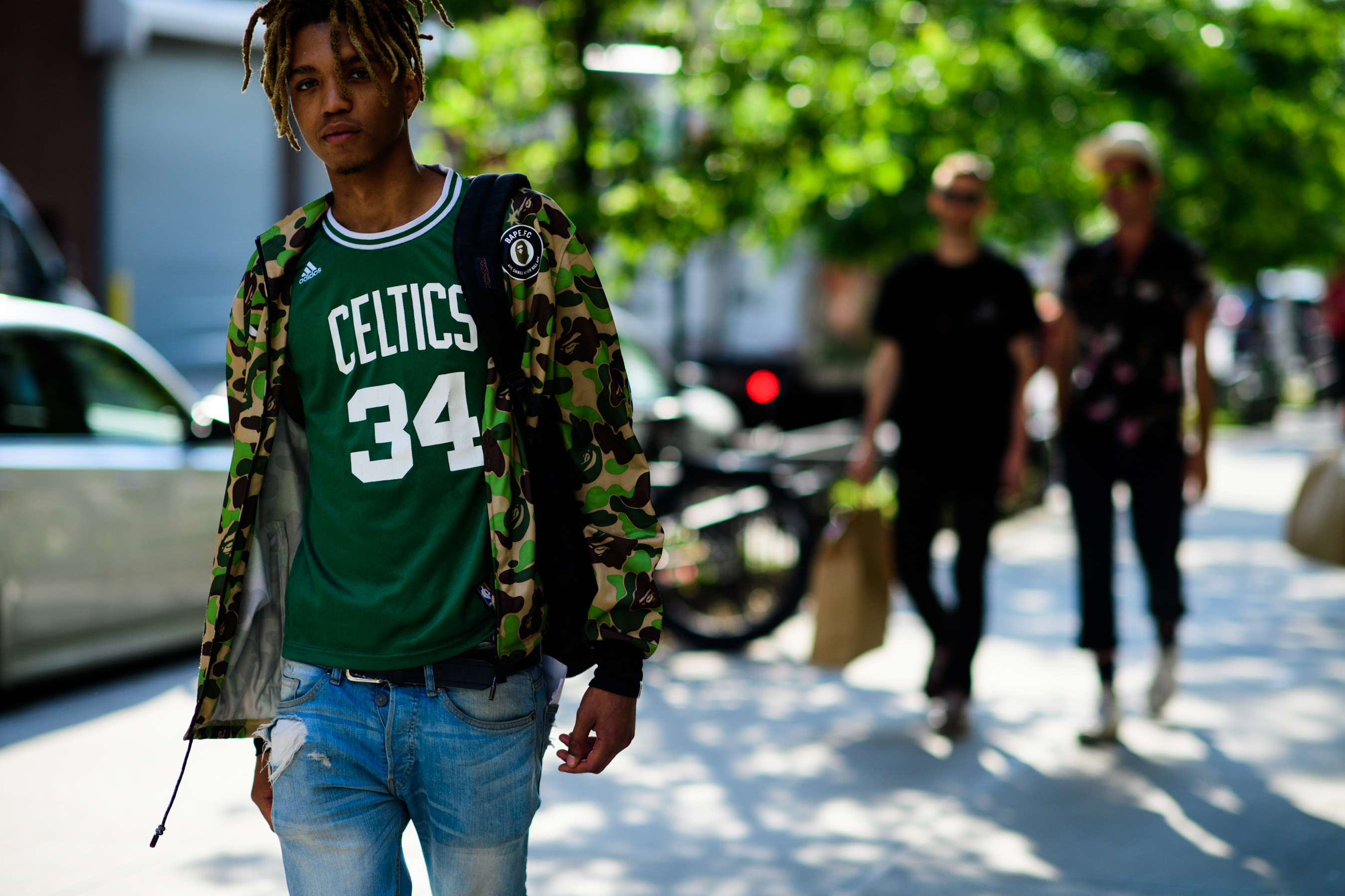 Young skater model dressed in camo