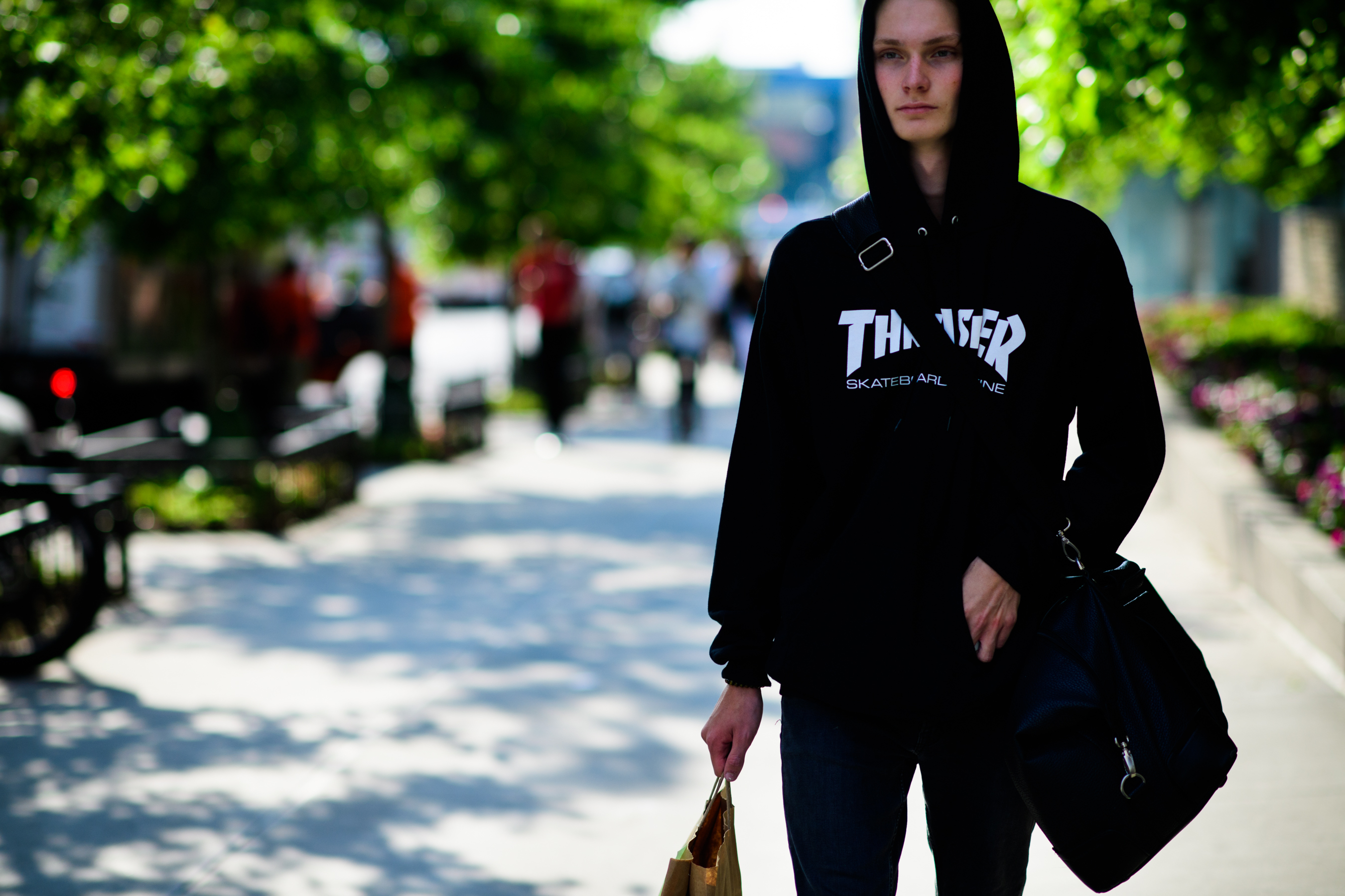 Young skater model wearing thrasher