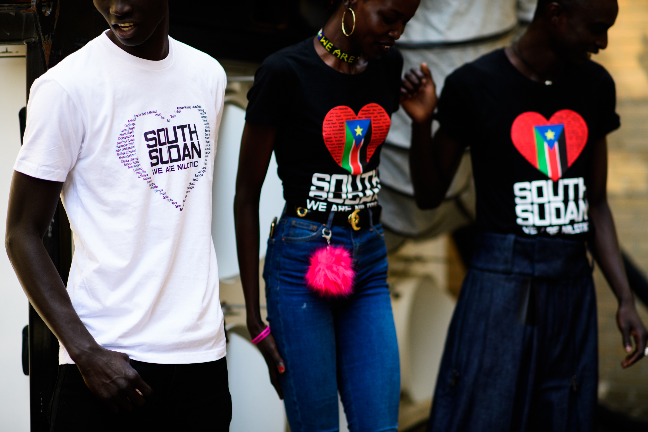 Group of models in Sudan t-shirts