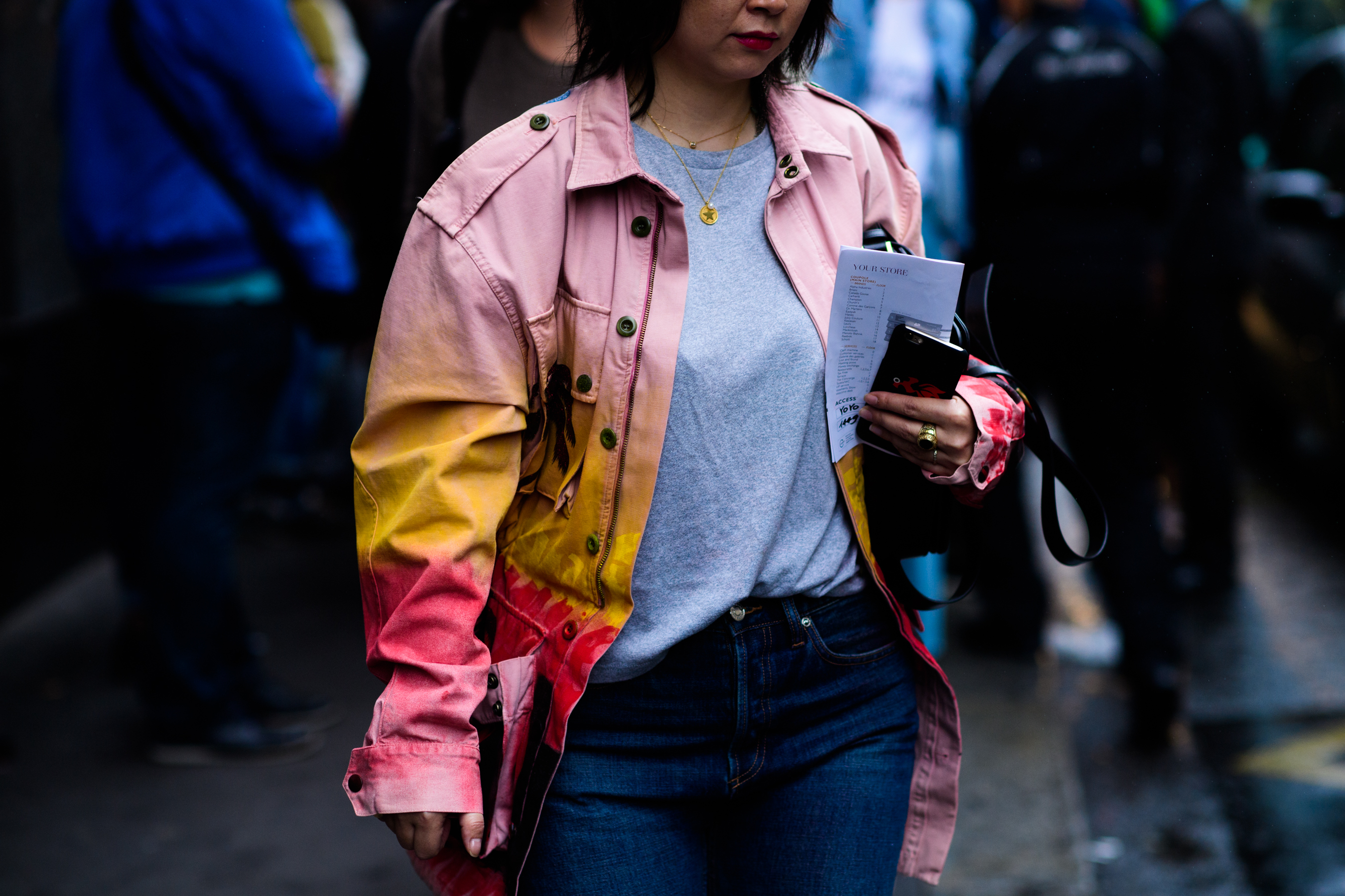 Woman in pastel pink jacket