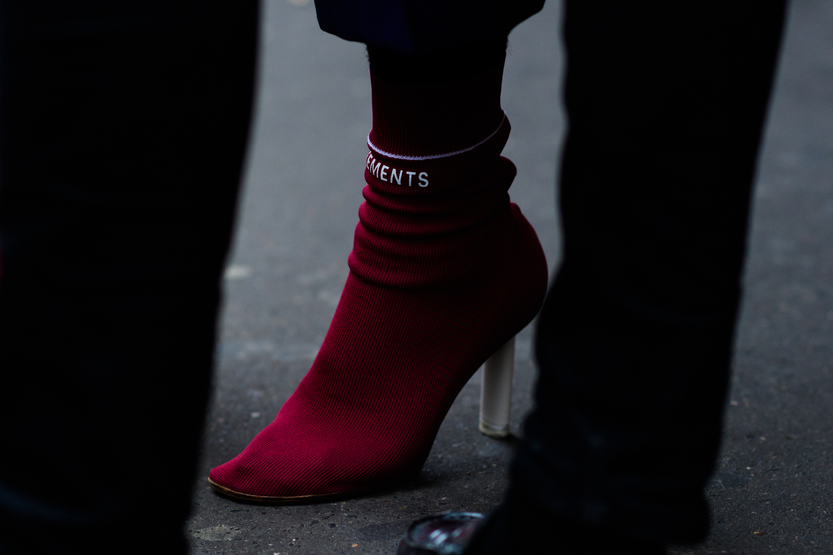 Woman wearing fuxia high-heeled shoes