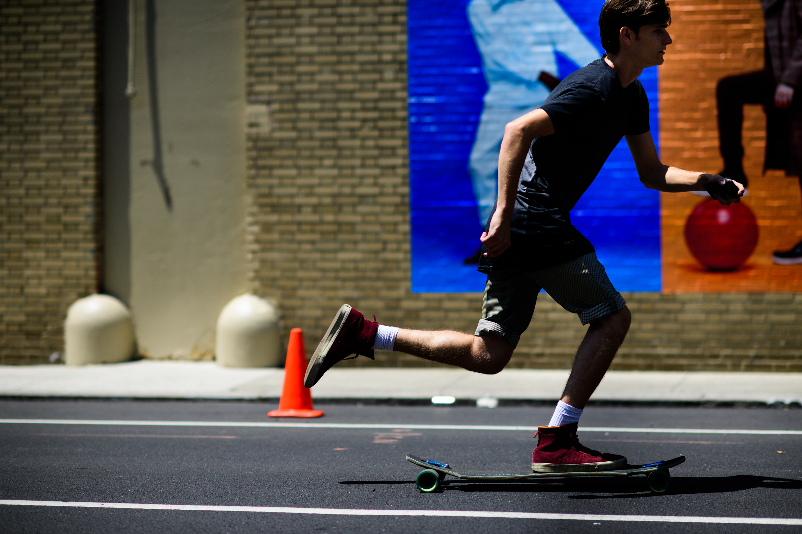 American male model on longboard