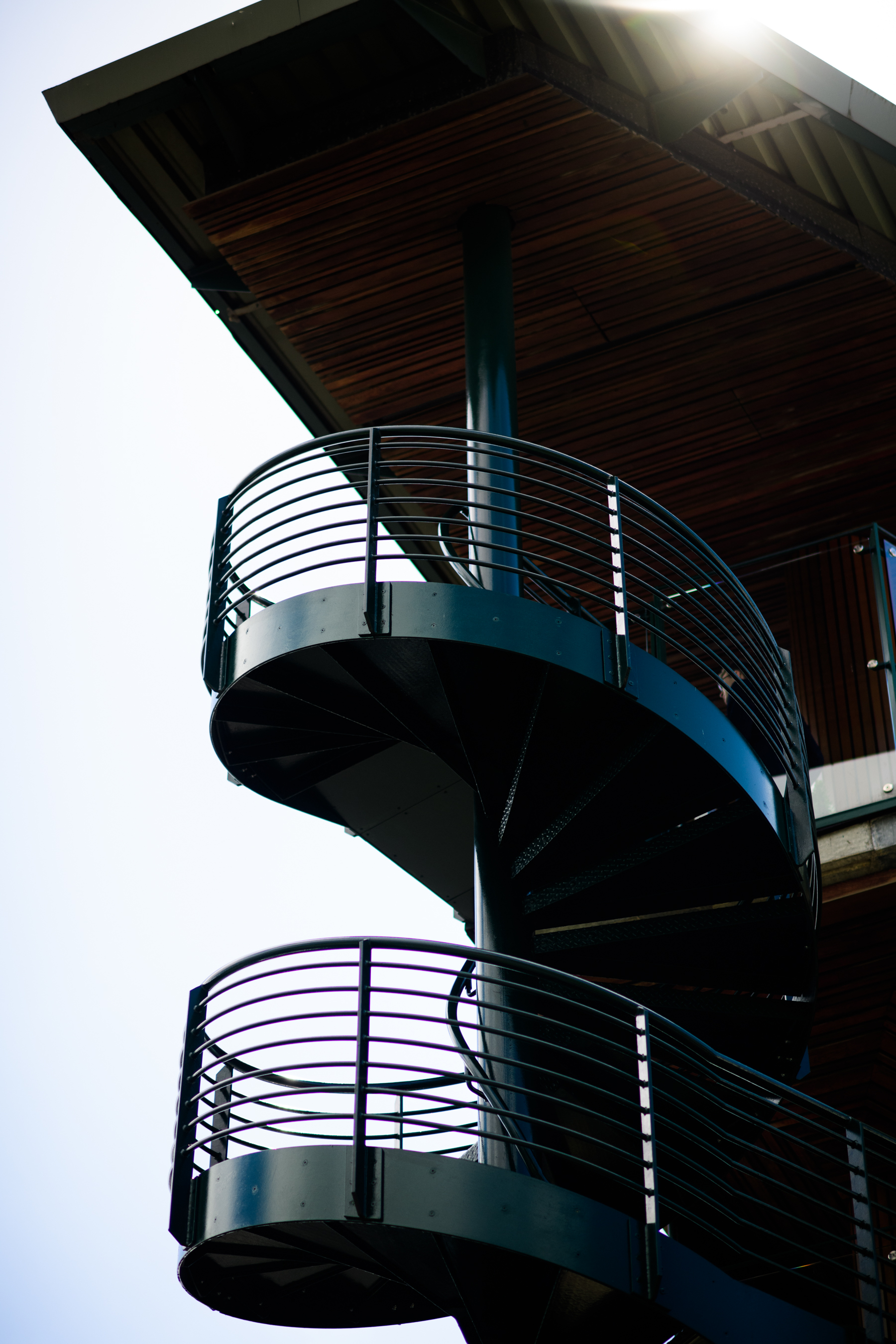 Metal stairs and wooden roof