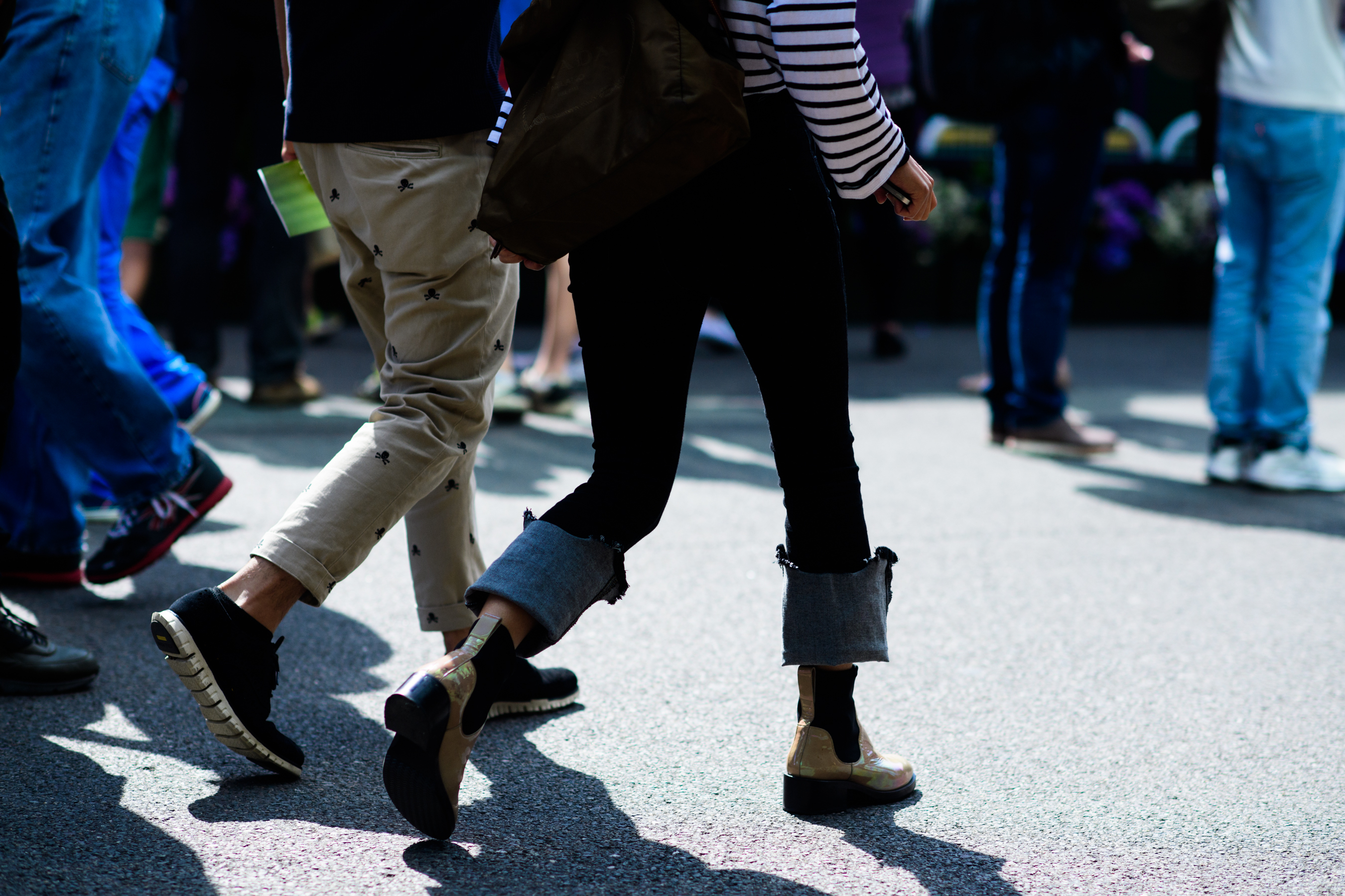 Man and woman wearing beige and denim