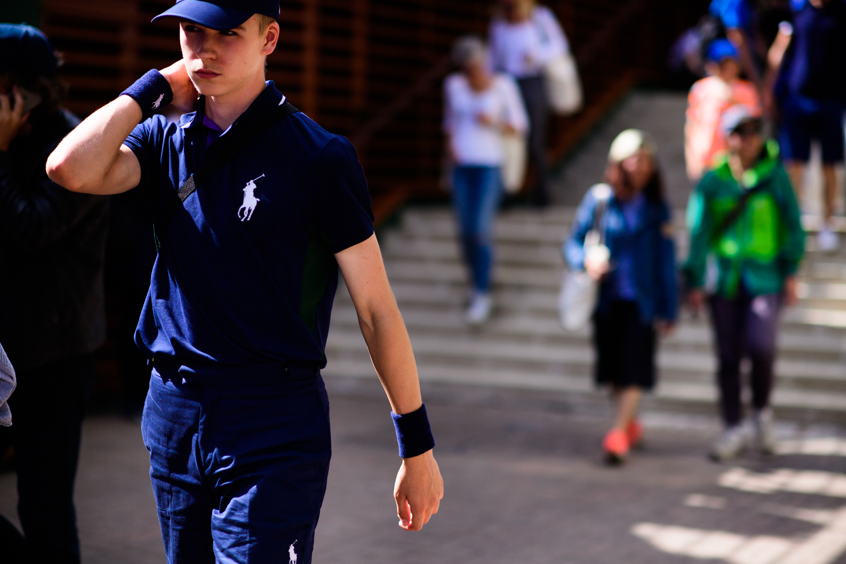 Young man wearing Ralph Lauren uniforma