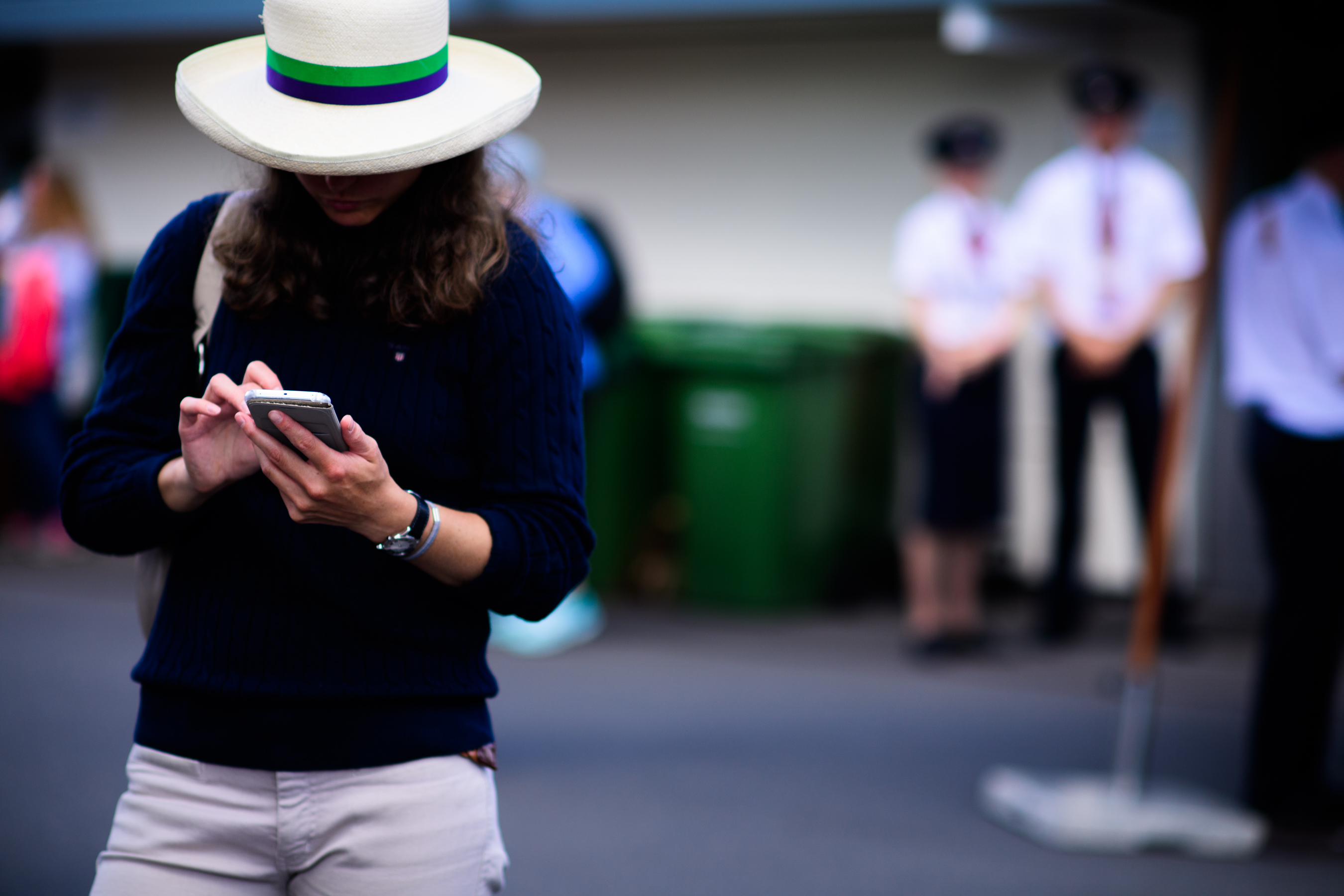 Woman wearing big white hat