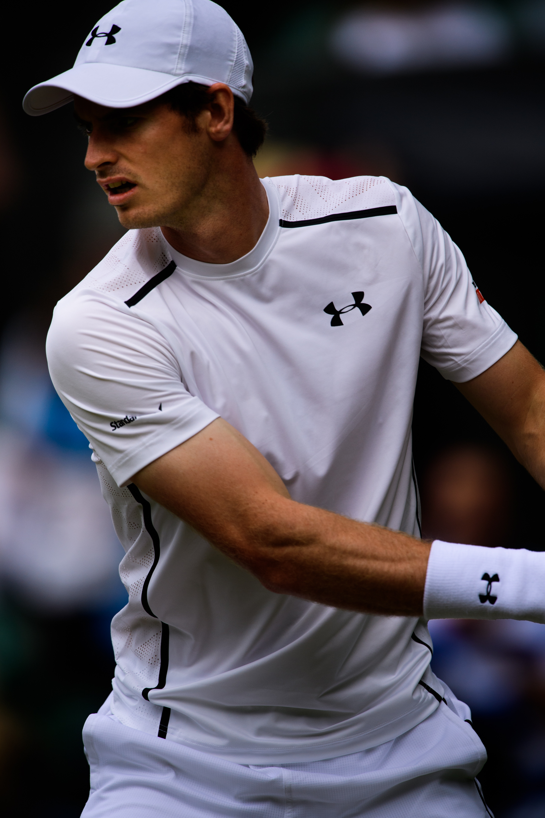 Professional Scottish tennis player wearing white