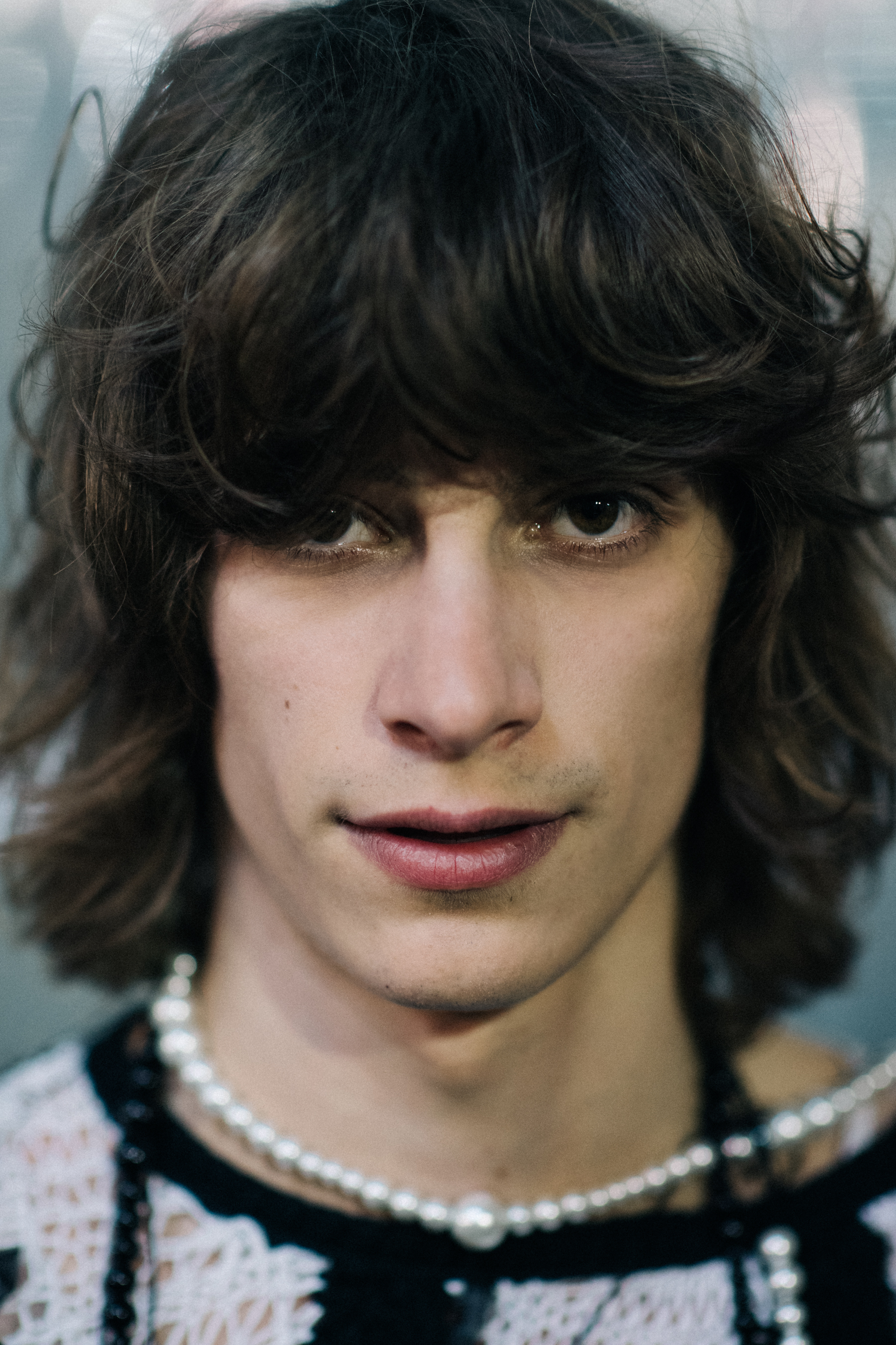 Long-haired male model portrait