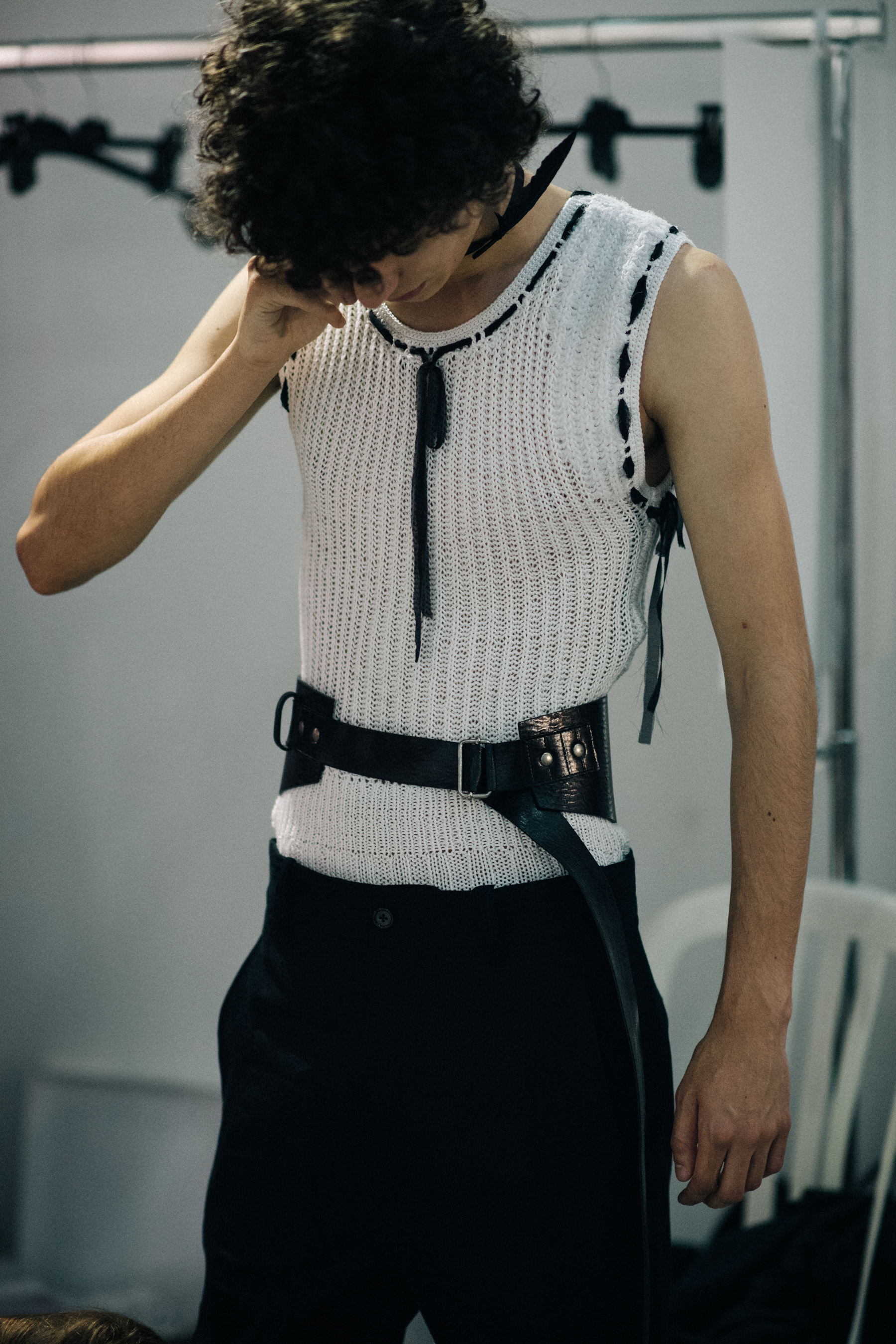 Male model wearing white vest