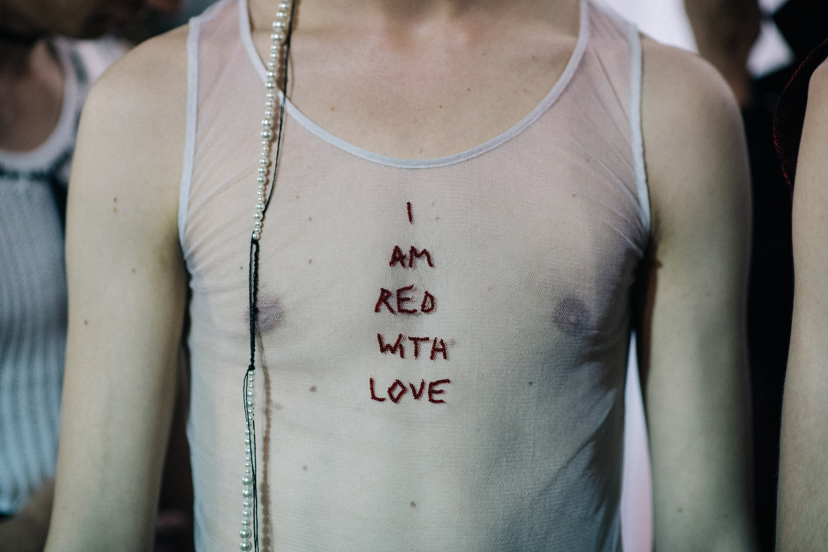 Male model in white vest