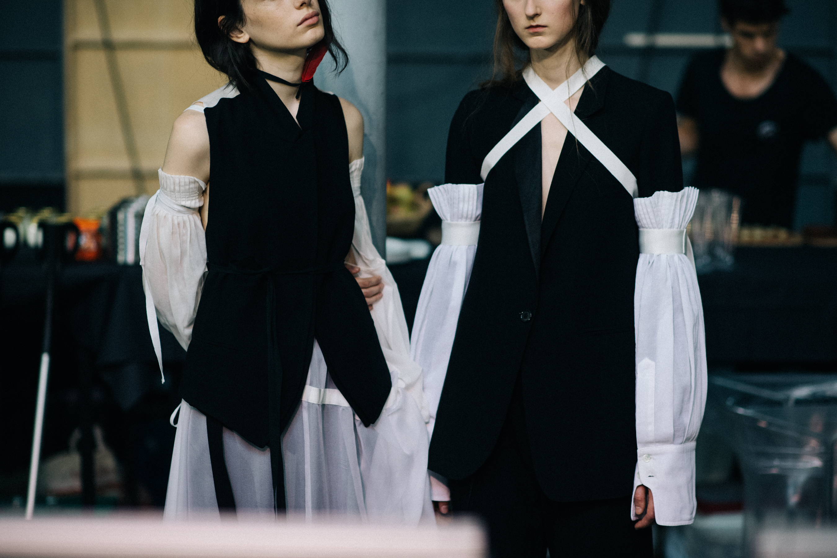 Female models in black shirts