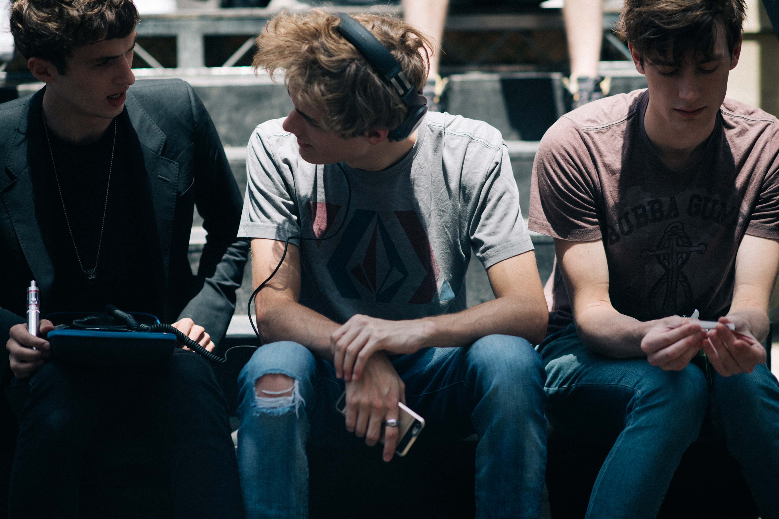 Three male models before the show
