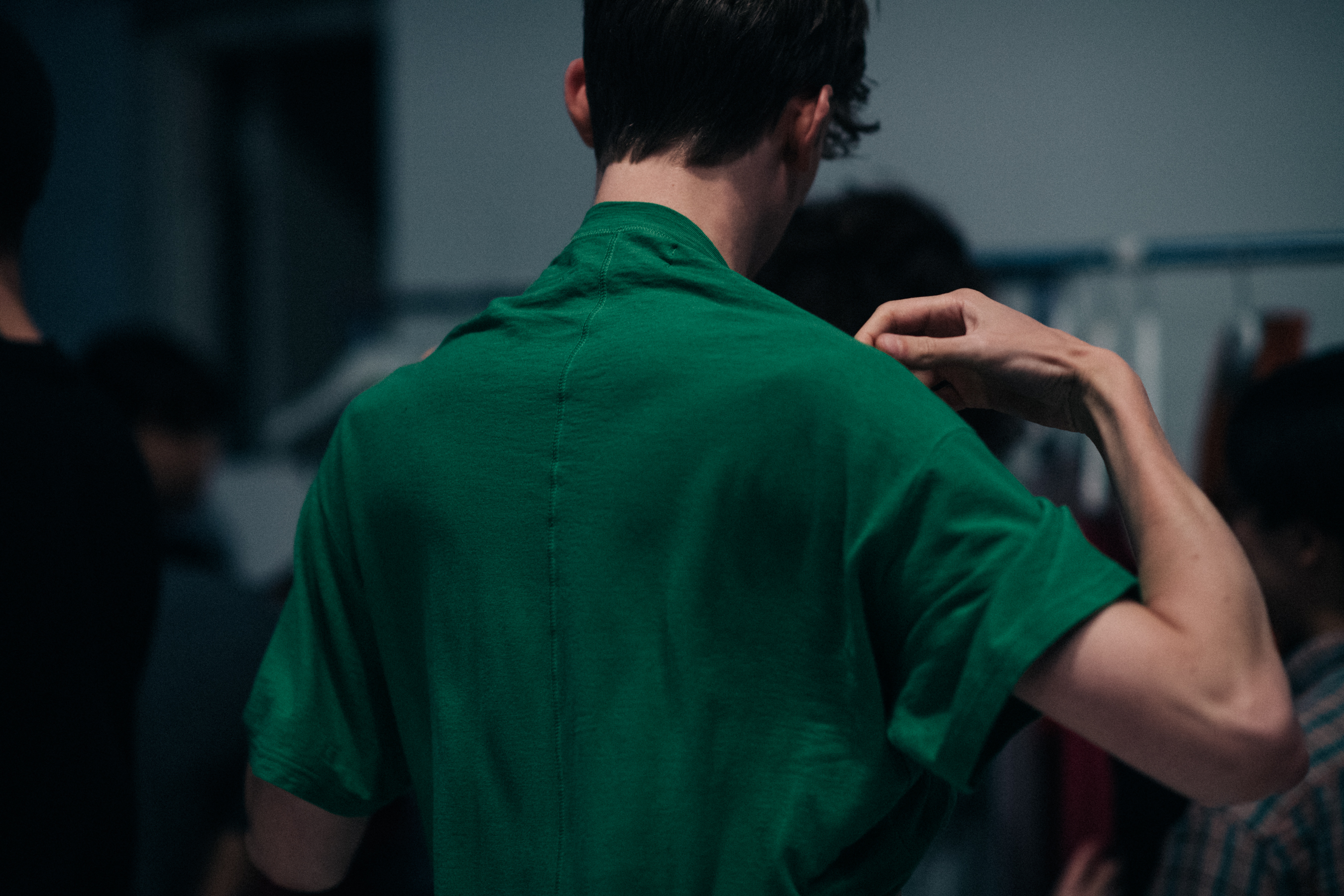 Male model wearing green shirt