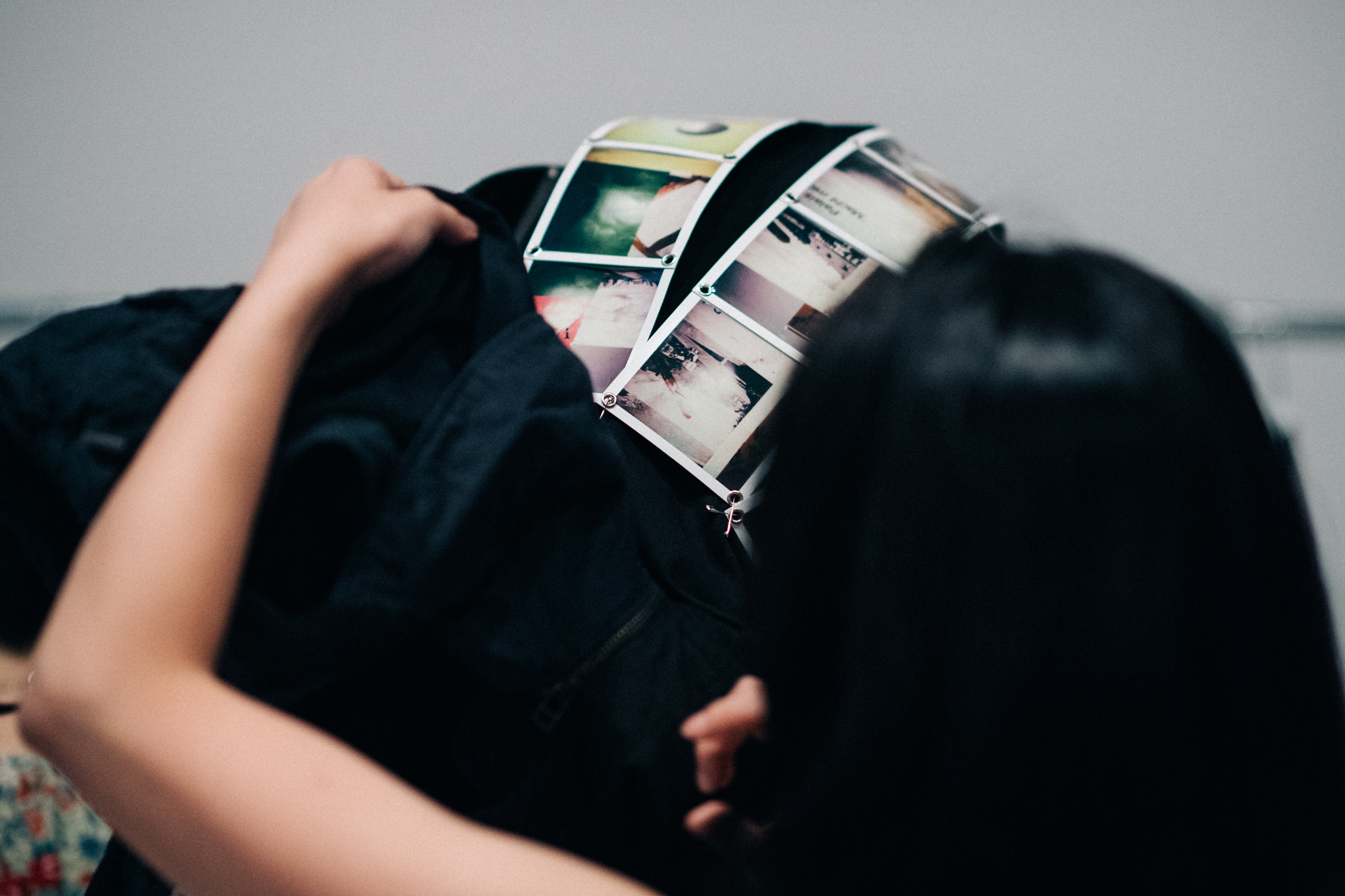 Jacket with polaroid photos attached