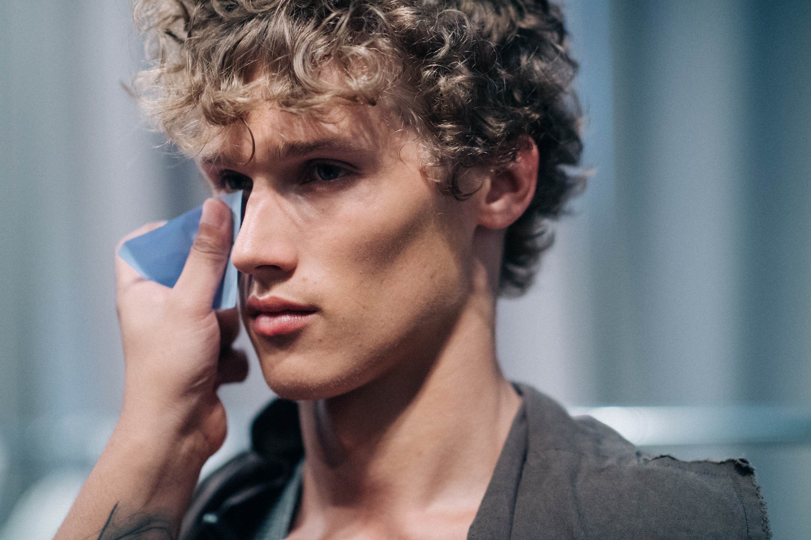 Dutch male model getting make up done