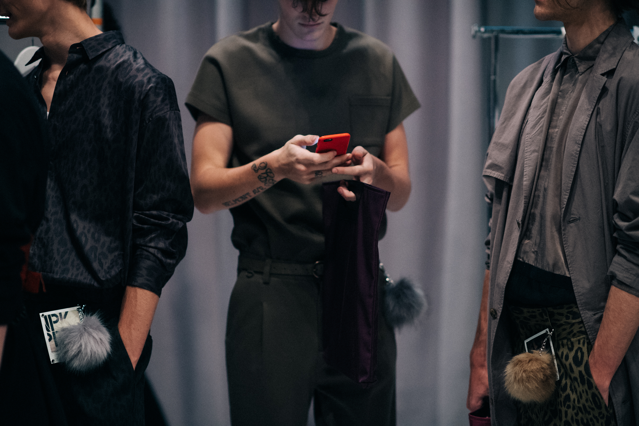 Group of male models wearing grey