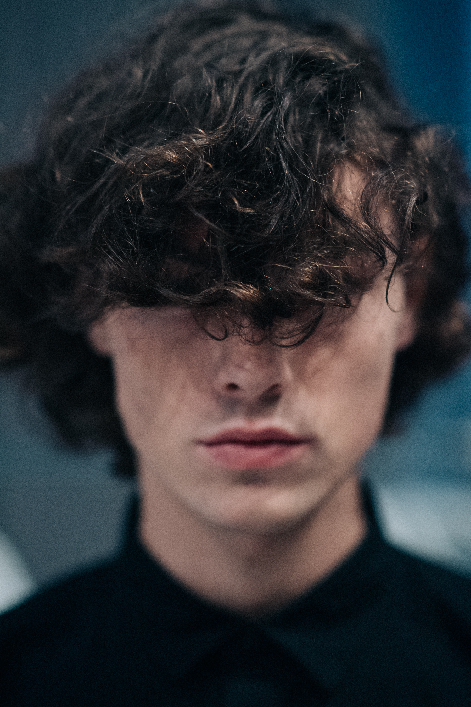 Portrait of male model long hair