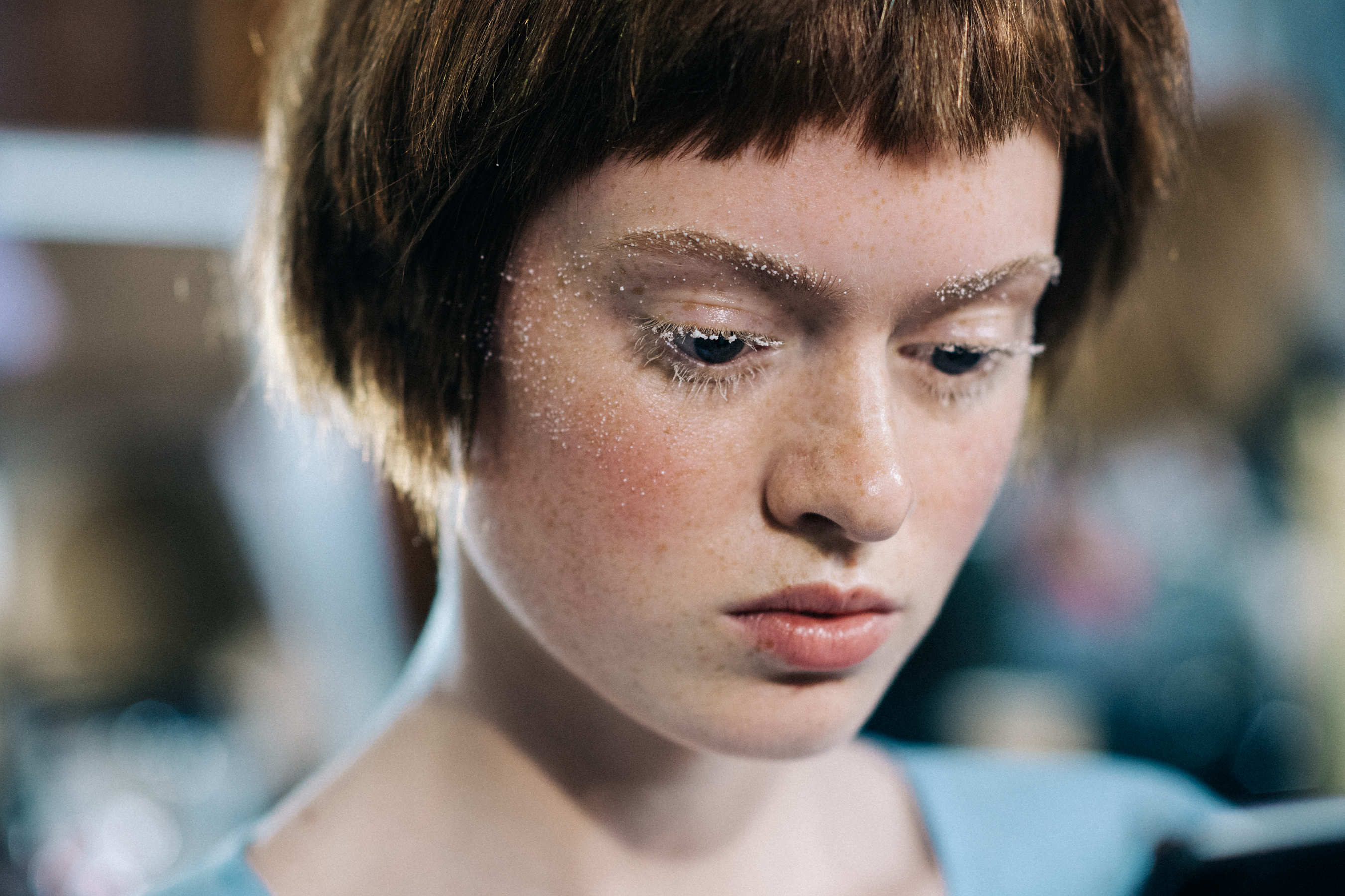 Model with freckles snow make up
