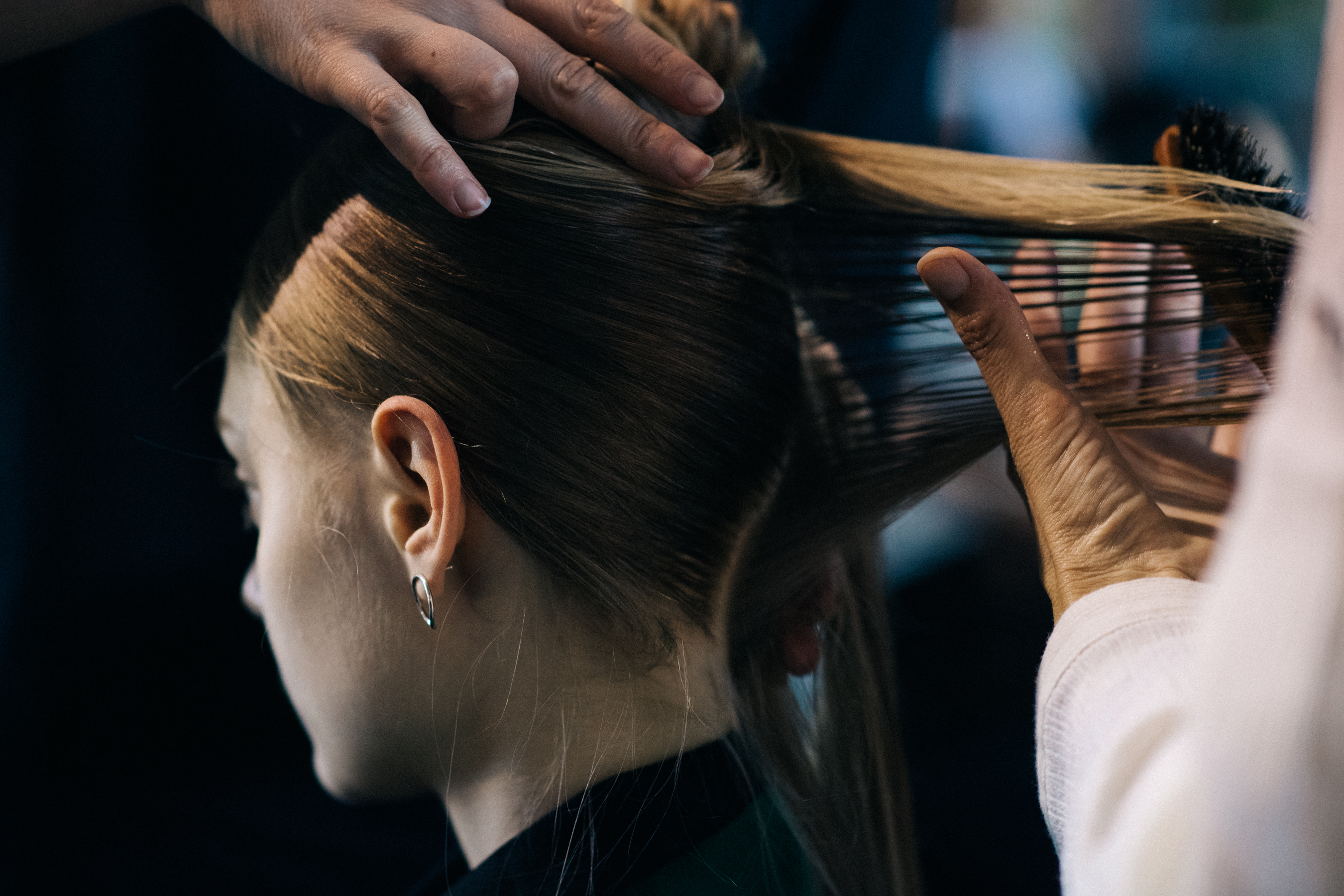 Model getting her hair done