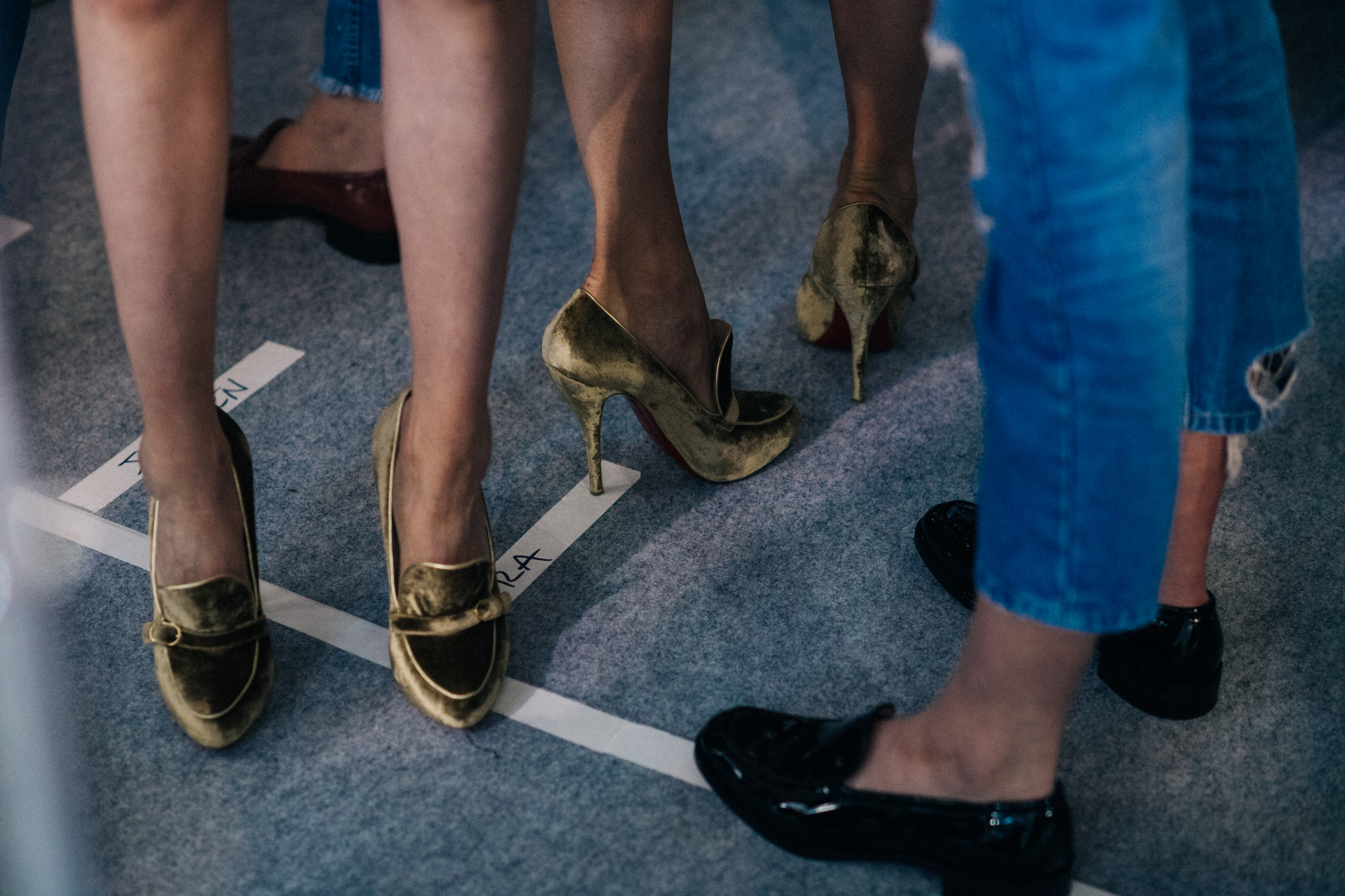 Group of models wearing Christian Louboutin