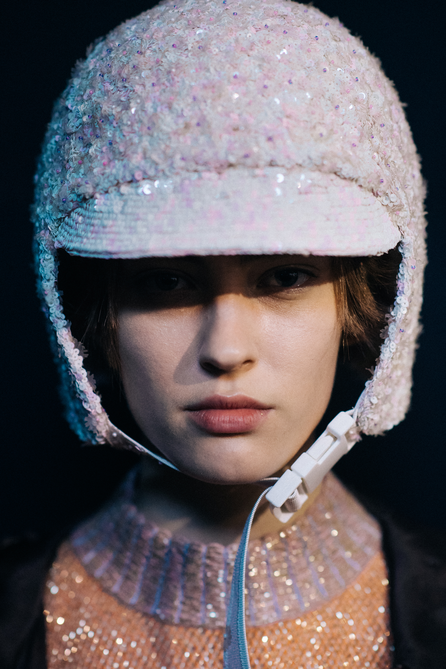 Portrait of a model wearing sequenced helmet