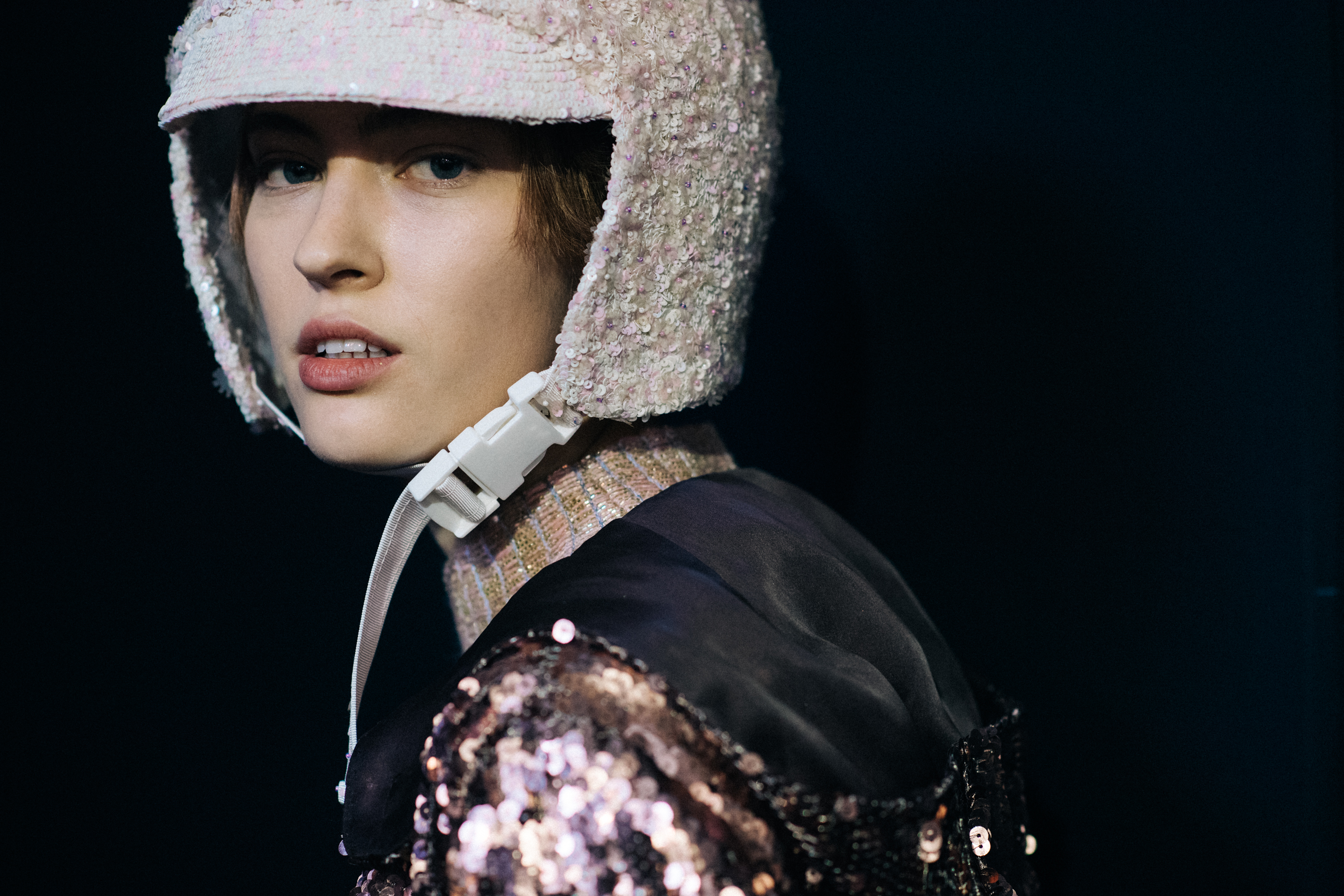 Model wearing sequenced helmet
