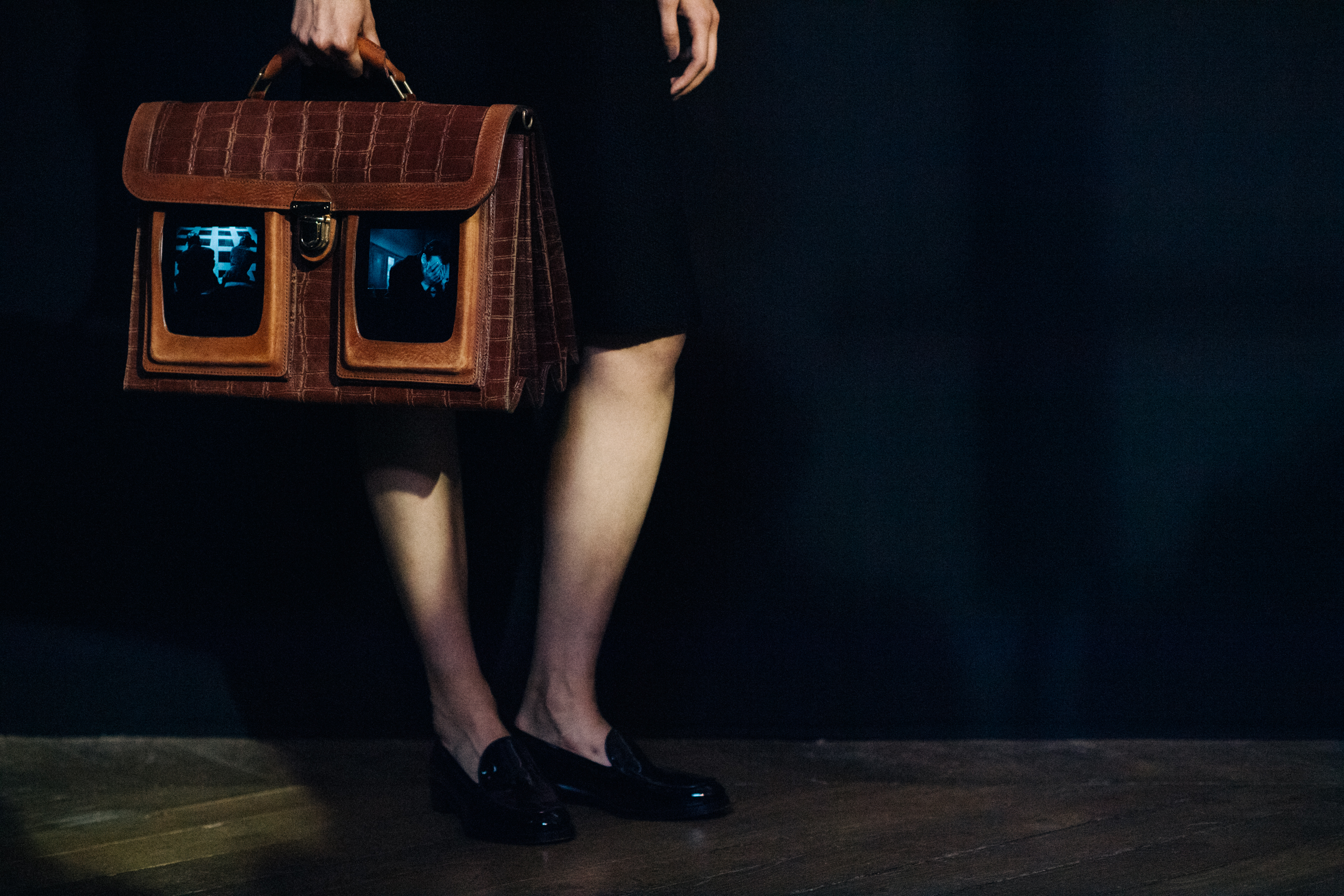 Leather bag with real film screens