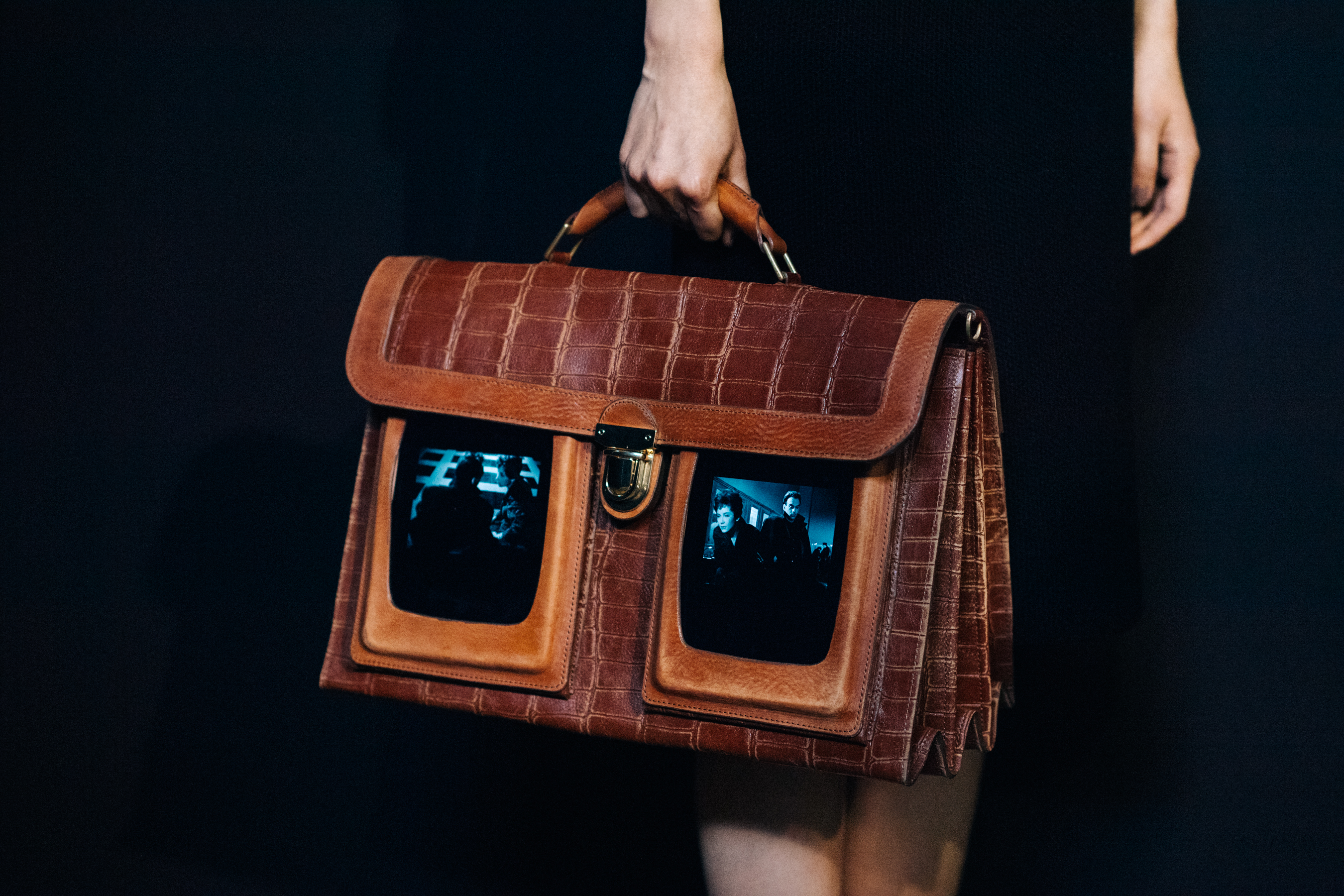 Leather bag with real movie screens
