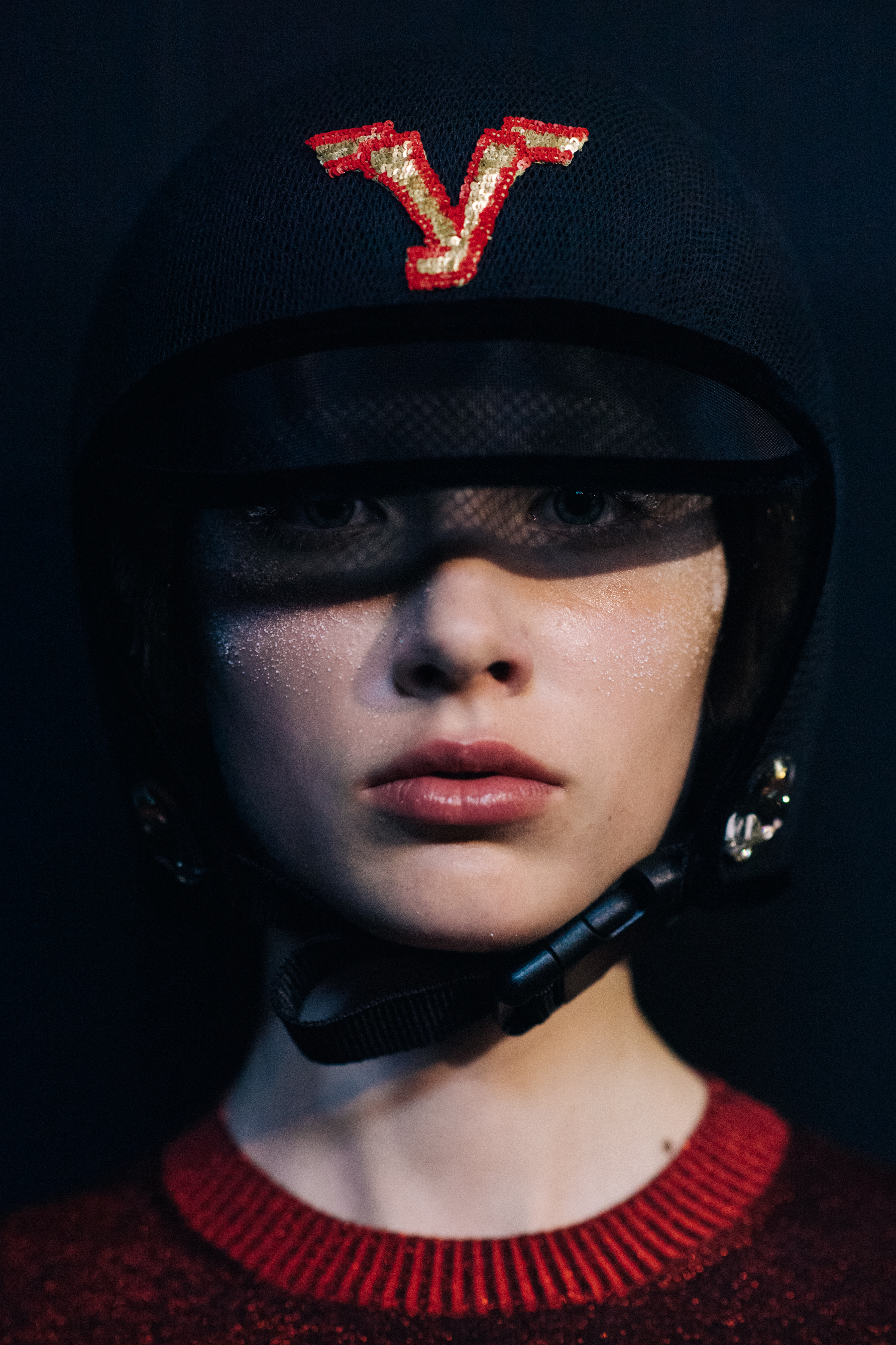 Portrait of a model wearing monogram helmet