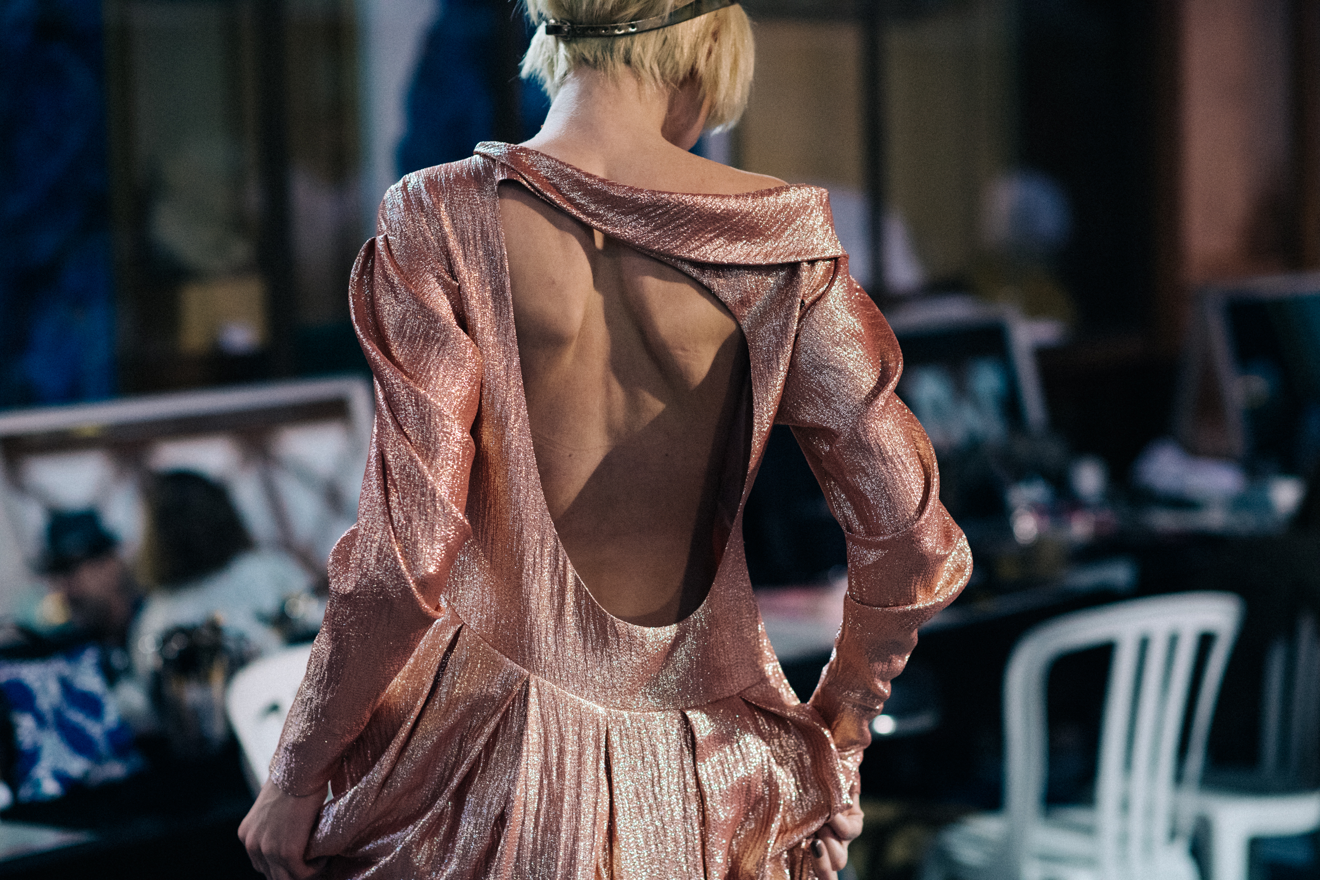 Russian model wearing pink shiny dress
