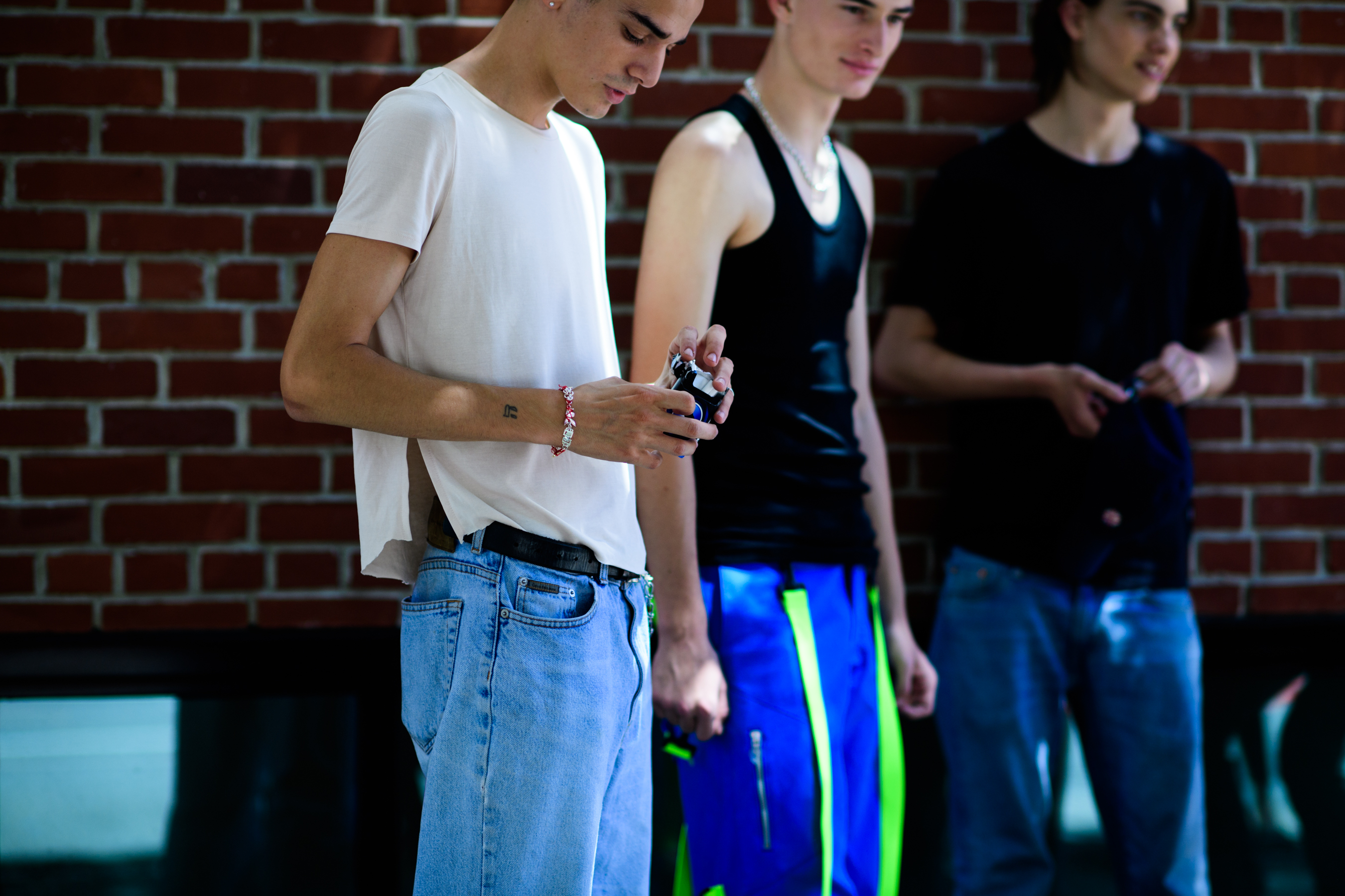 Group of male models before show