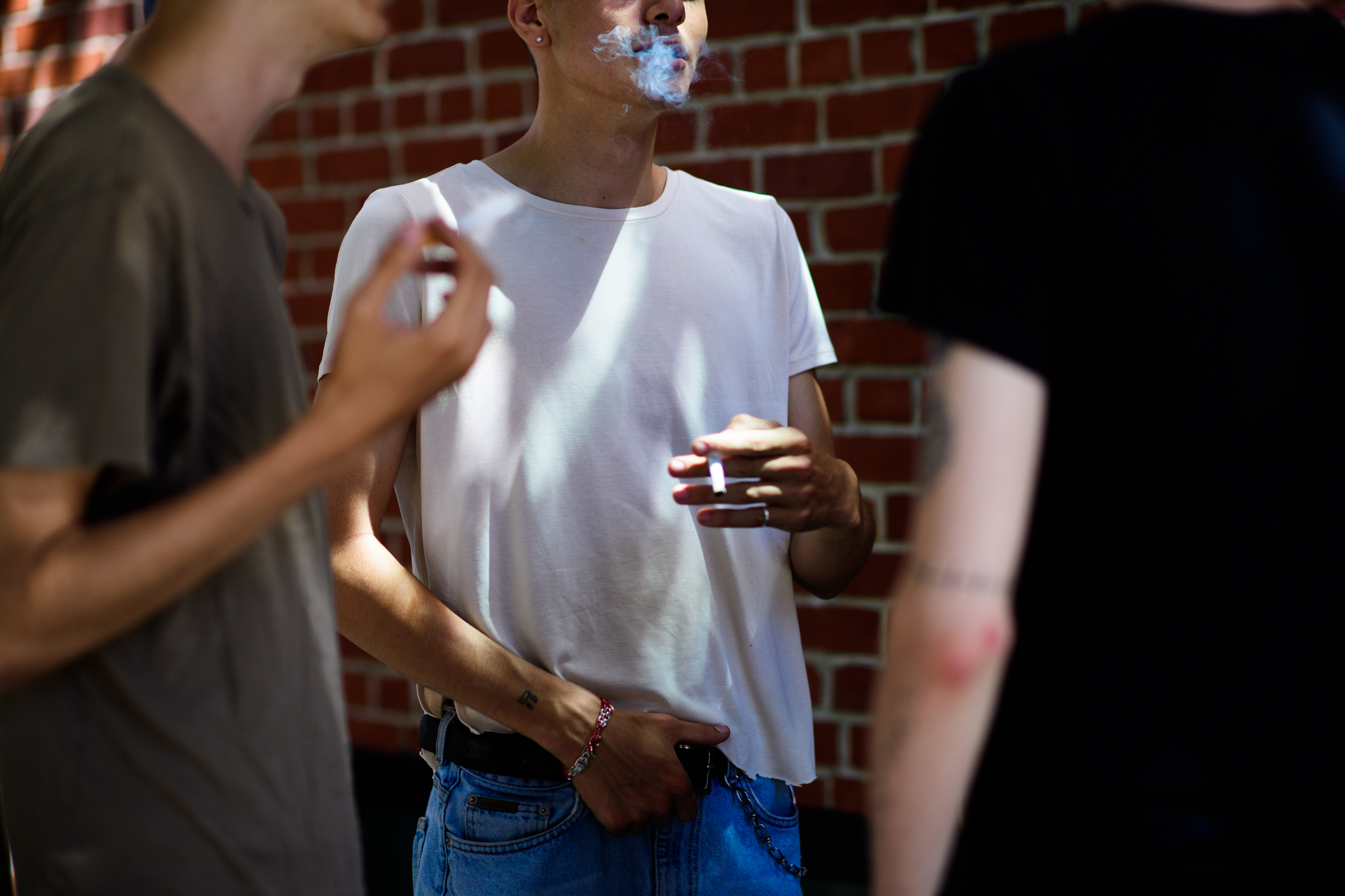 Male model smoking before show