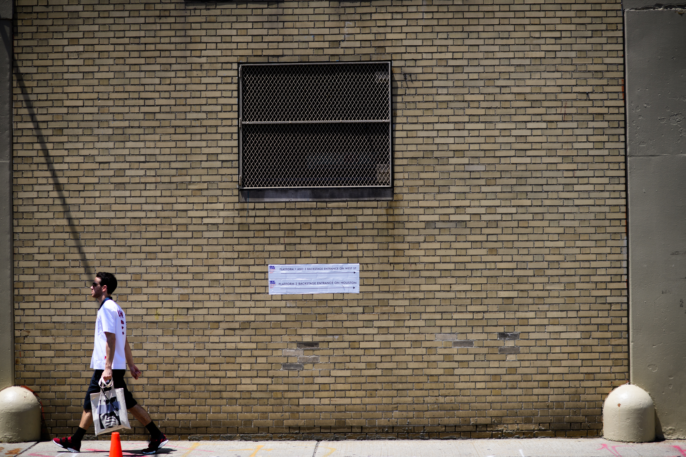 Man walking to the show at NYFWM